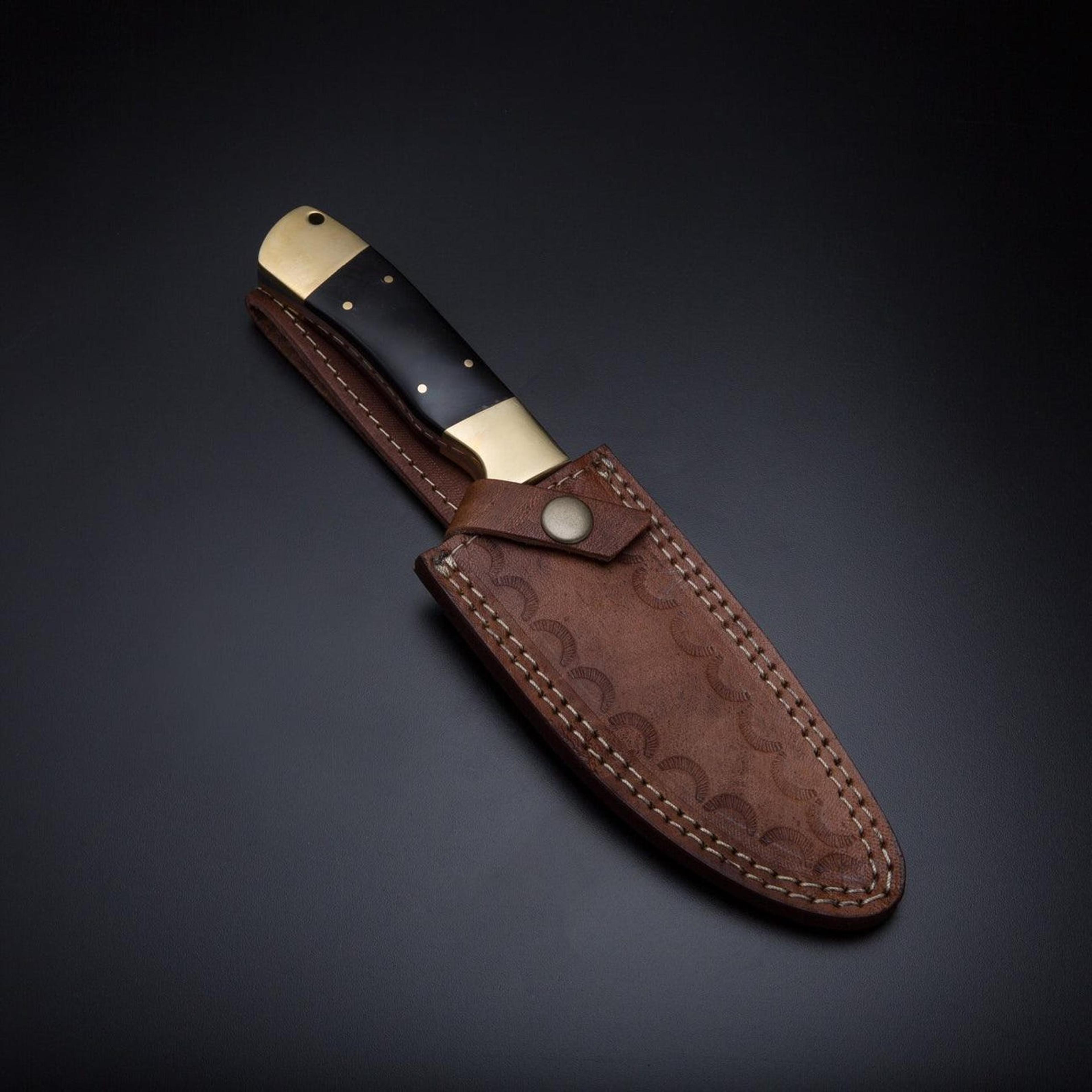 unique handcrafted damascus steel skinner knife with buffalo horn handle and leather sheath