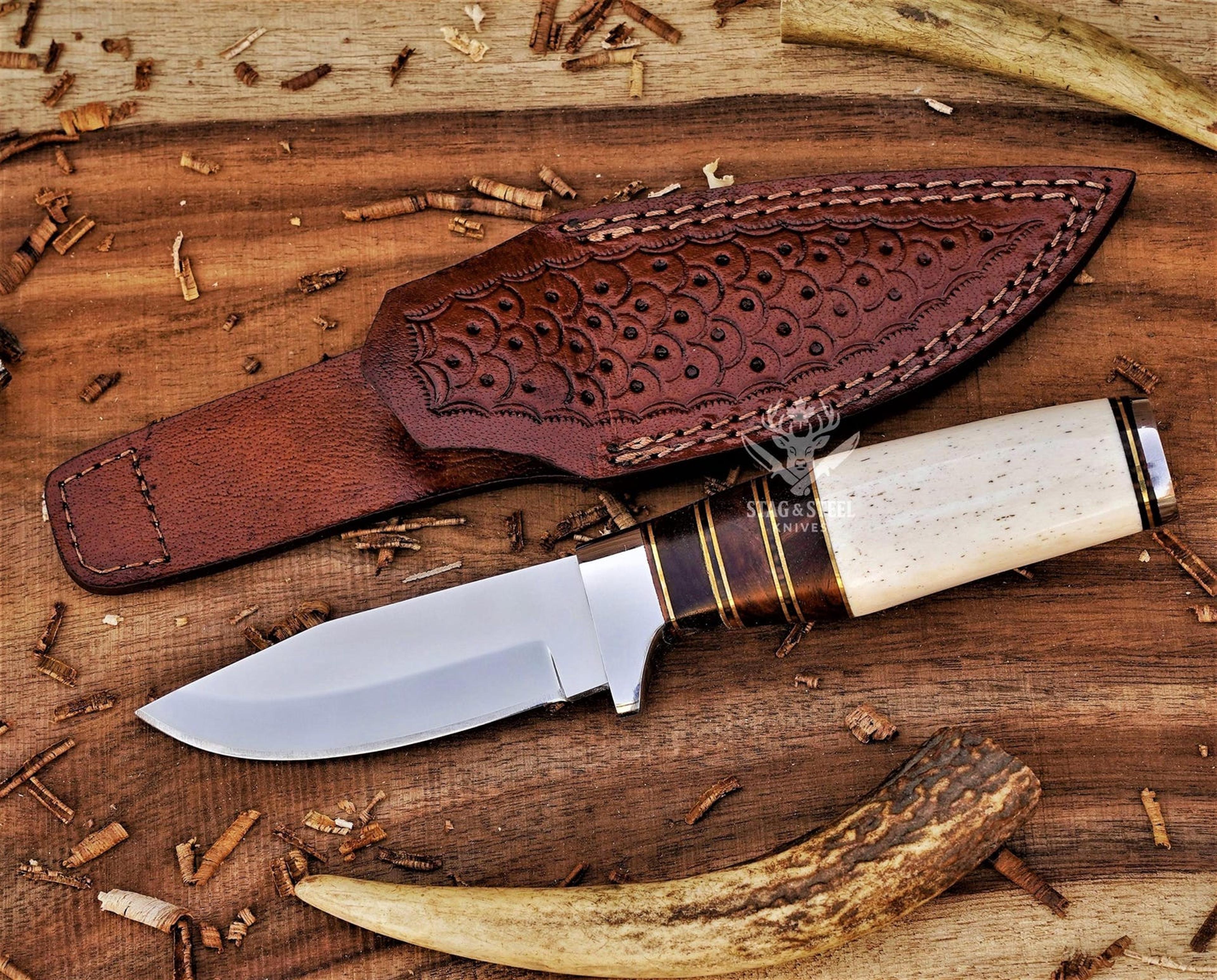 artisan crafted hunting knife with leather carry sheath