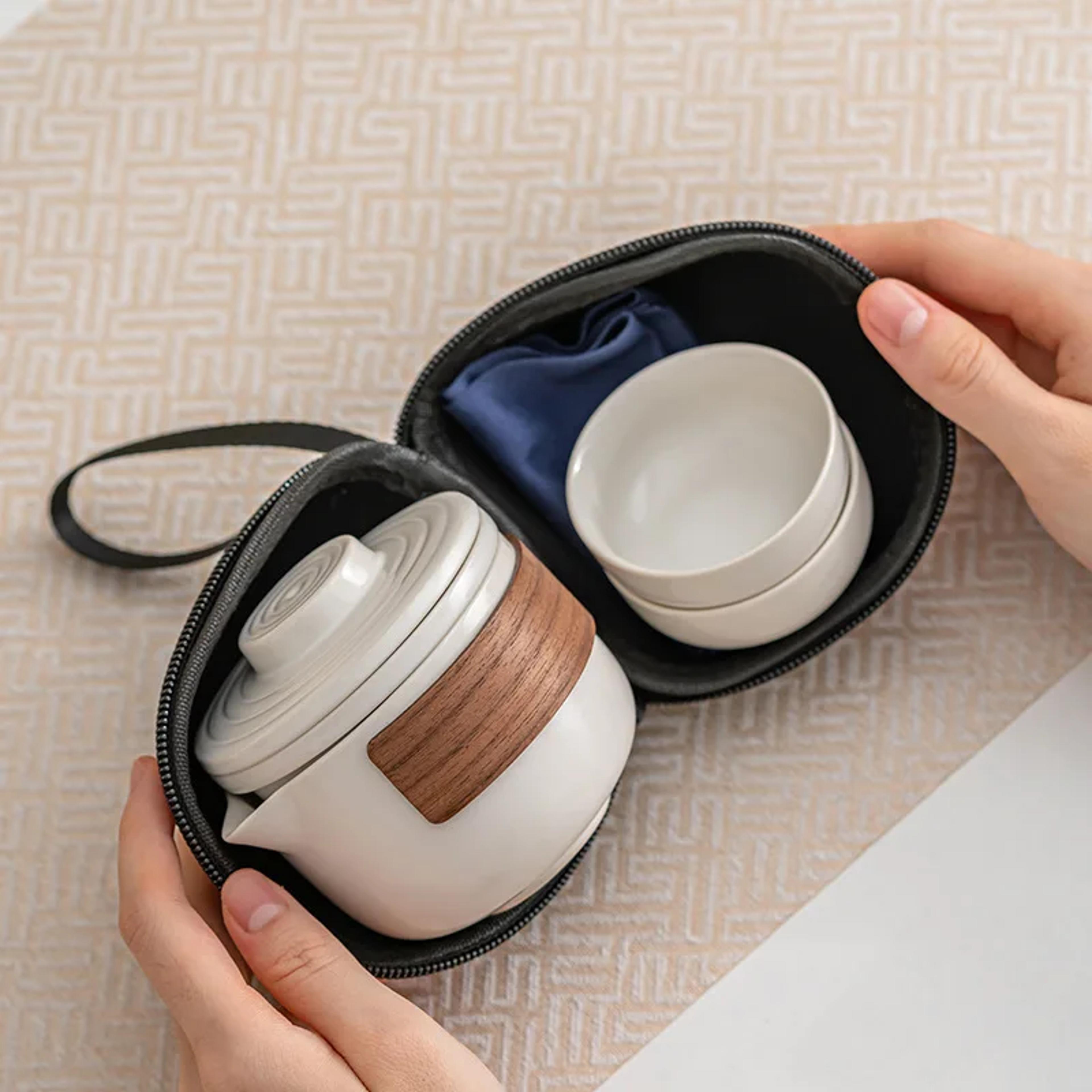 portable ceramic travel tea set with one pot and two cups