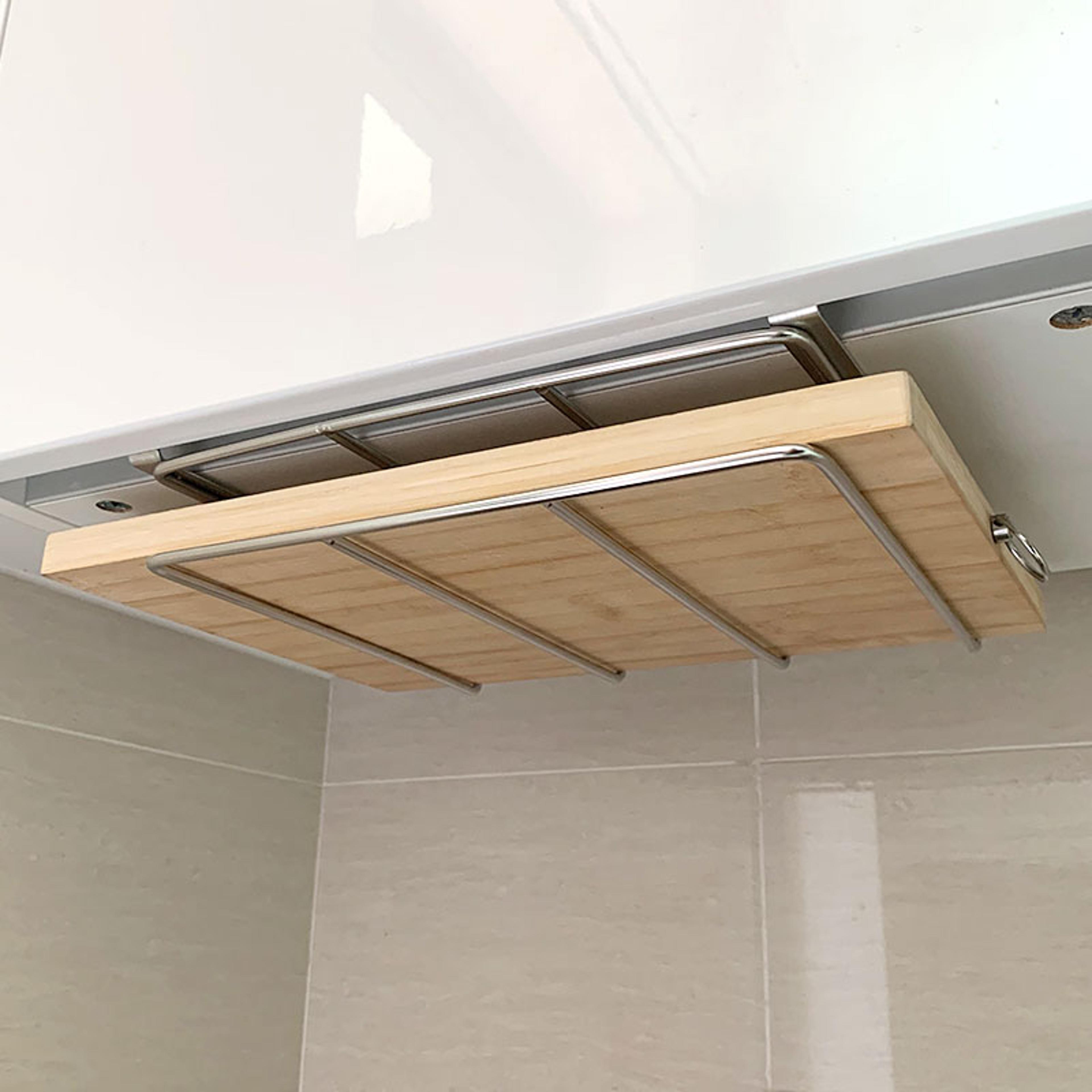 space saving under cabinet cutting board holder and pot lid organizer