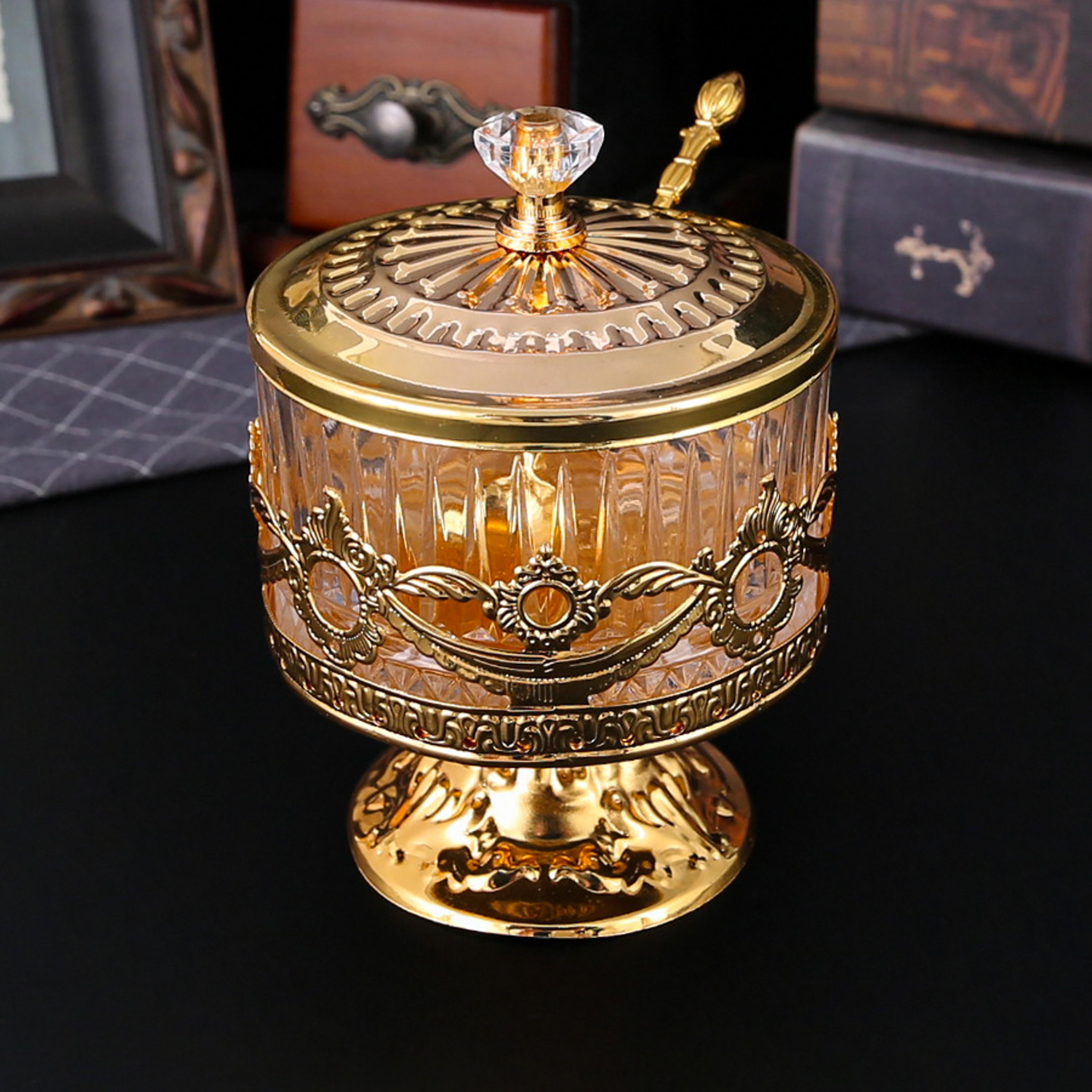 stylish metal and glass condiment jar, perfect for spices, salt, sugar, and kitchen storage