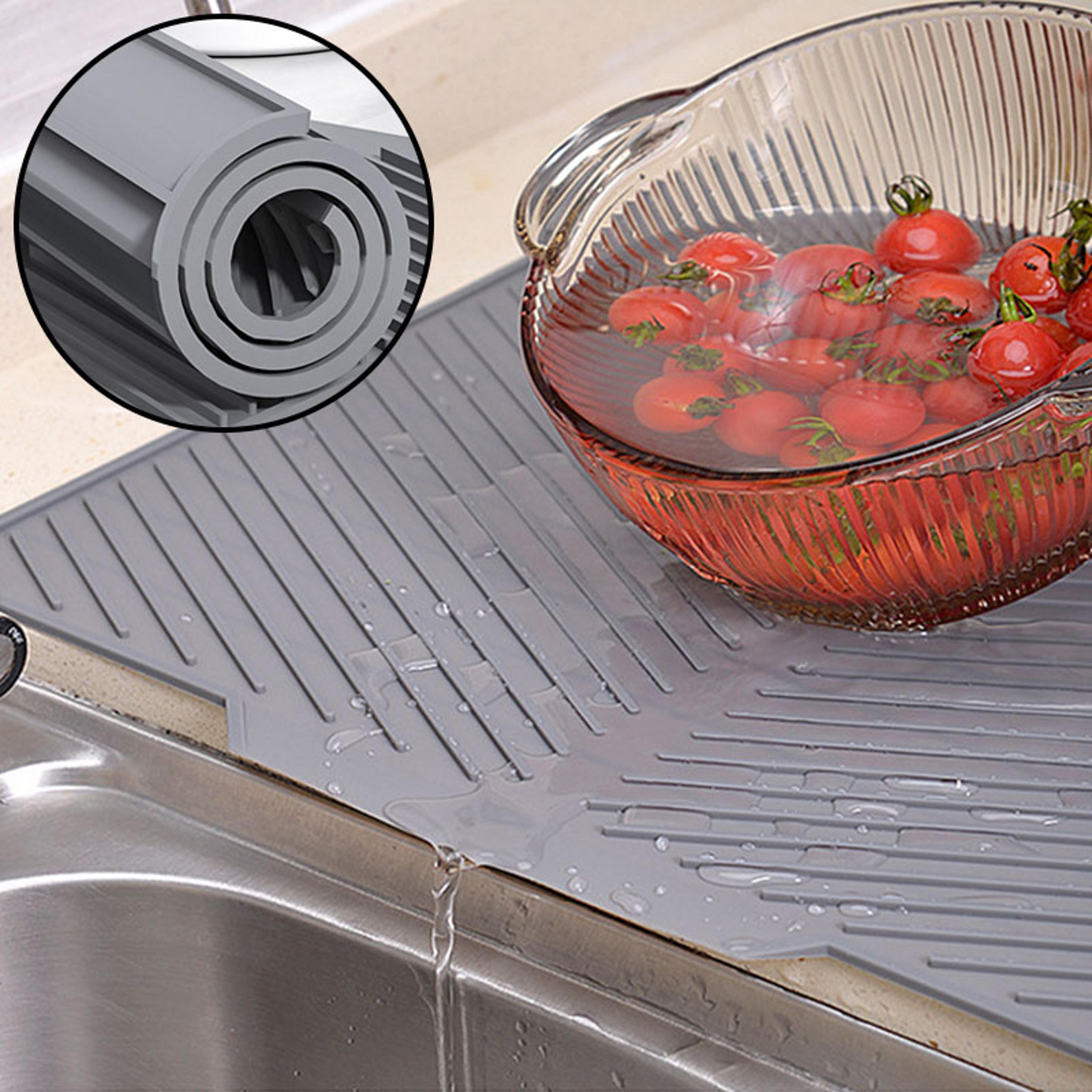 folding silicone draining mat heat resistant, raised edges, and easy to clean for kitchen use