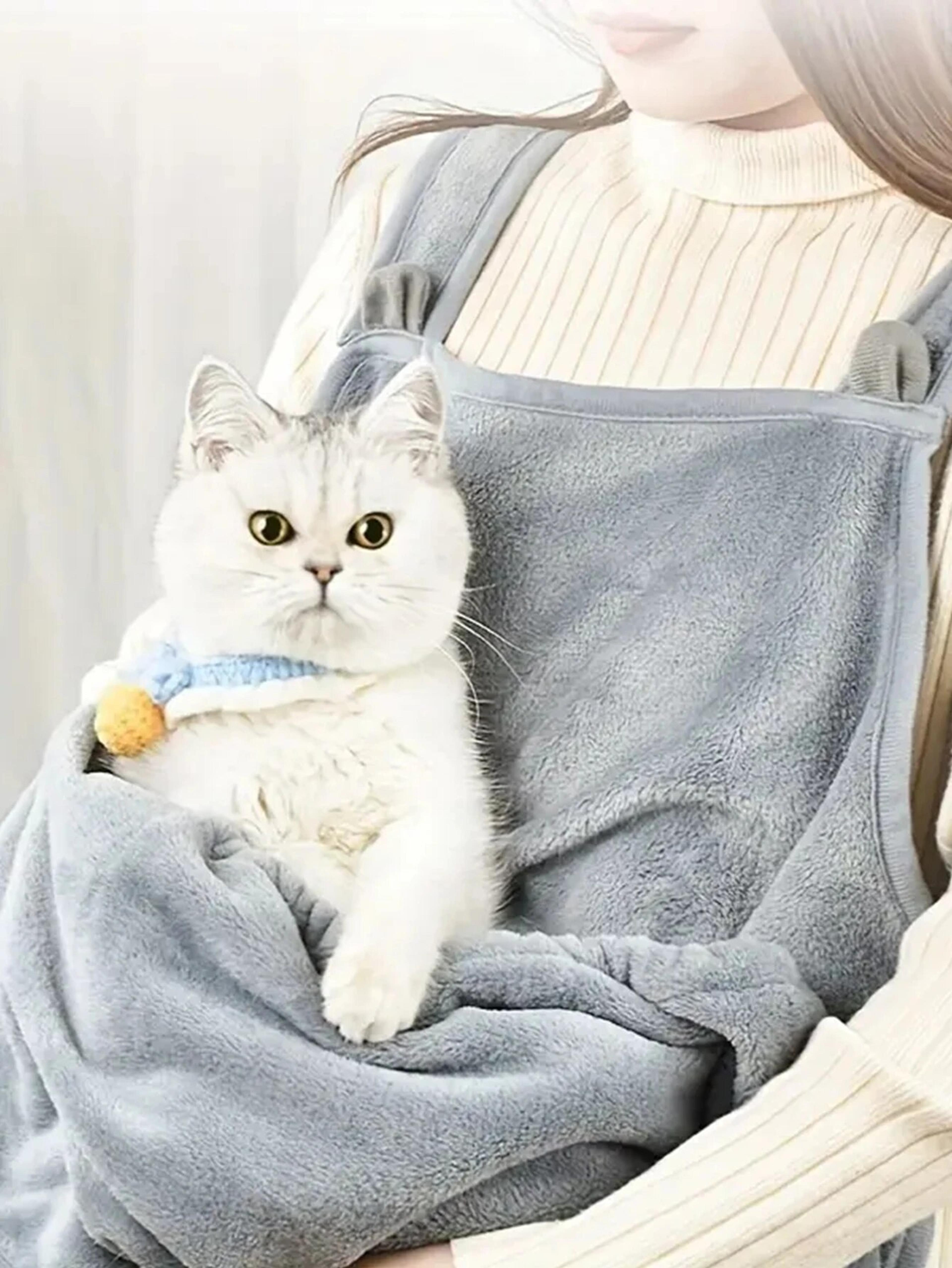 cozy pet carrier apron, ideal for small cats and dogs, outdoor winter travel, cat sleeping features