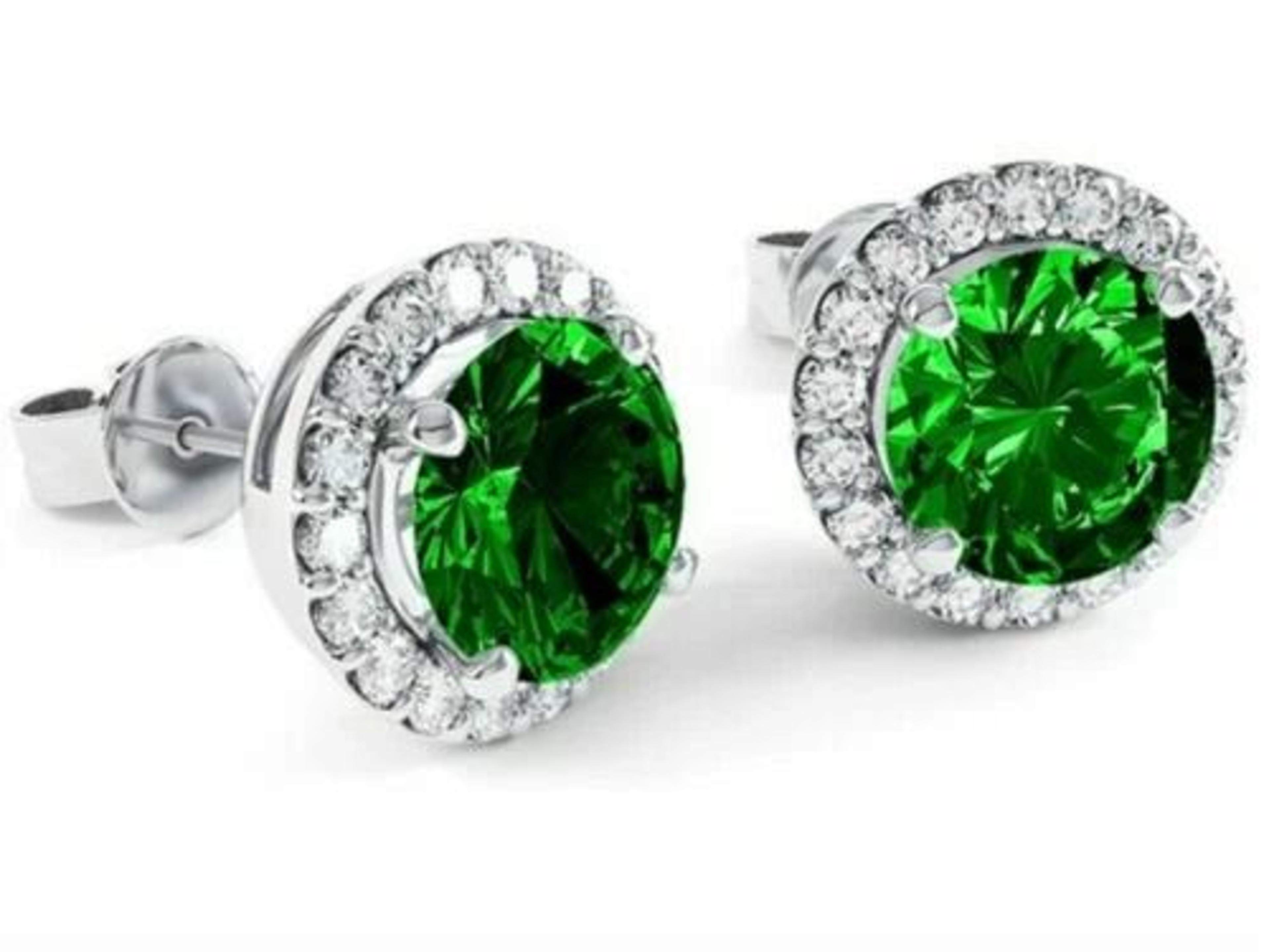 sterling silver round lab created emerald and white topaz halo stud earrings
