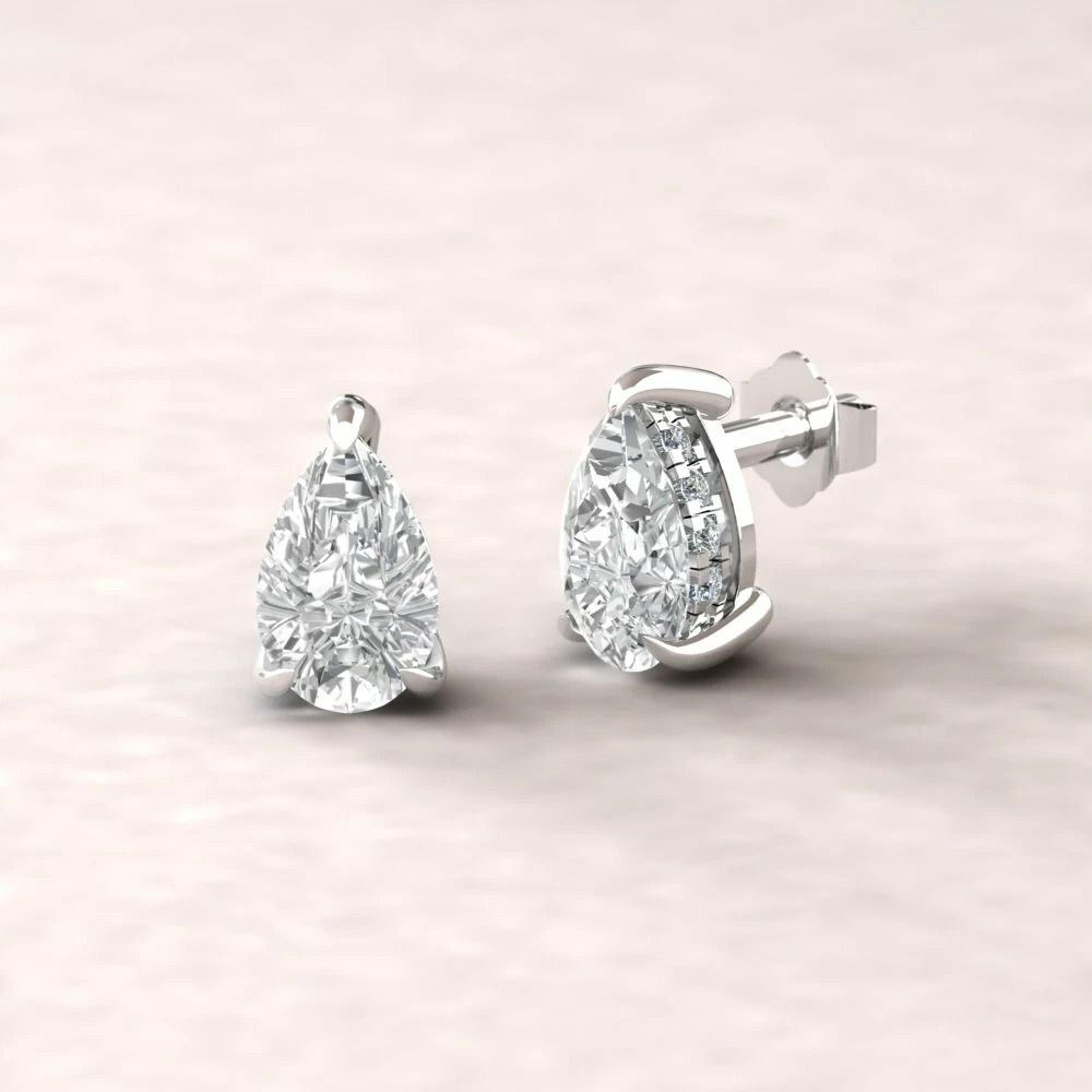 pear shaped cubic zirconia stud earrings, sterling silver earrings, elegant push style backing