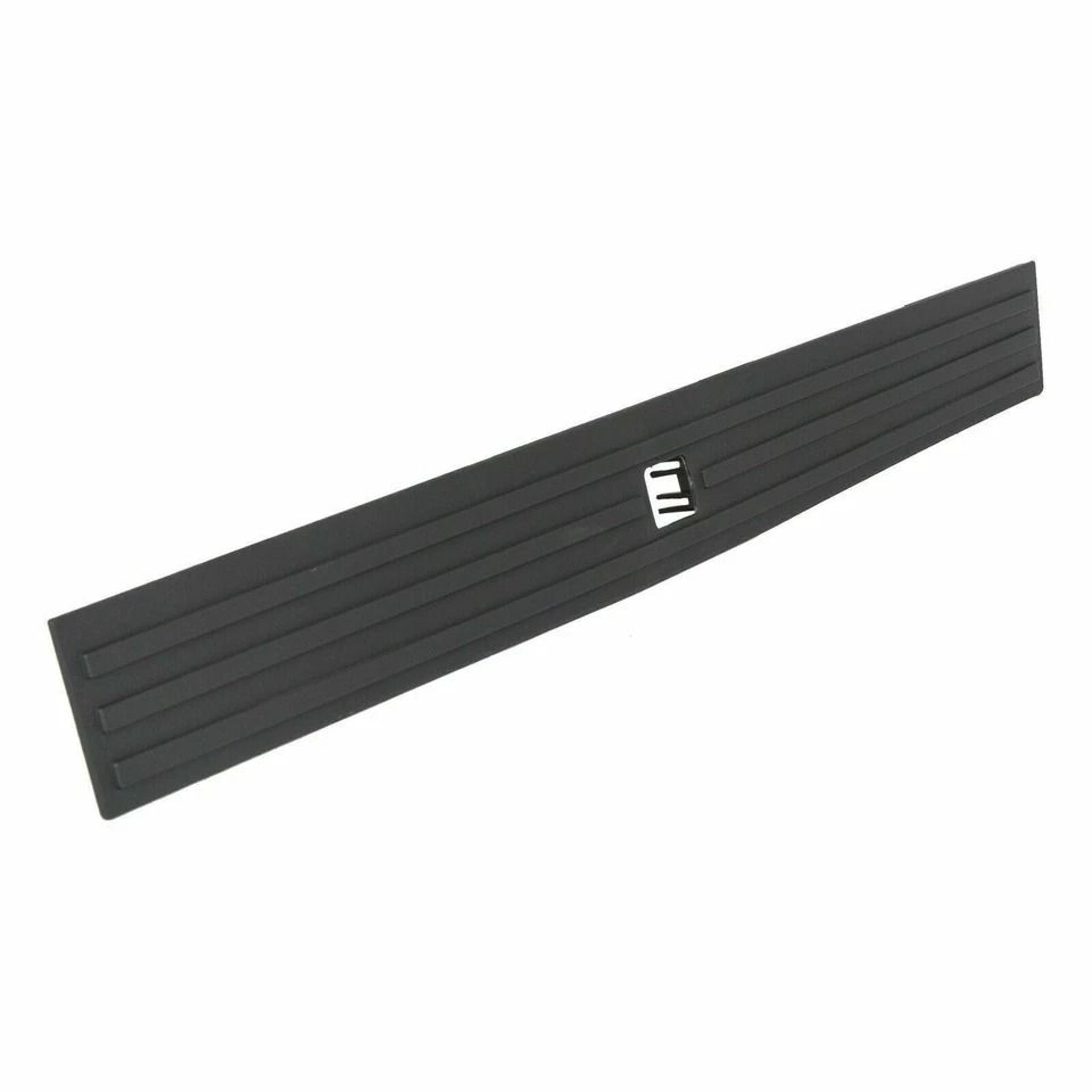 tailgate molding cover with flexible step