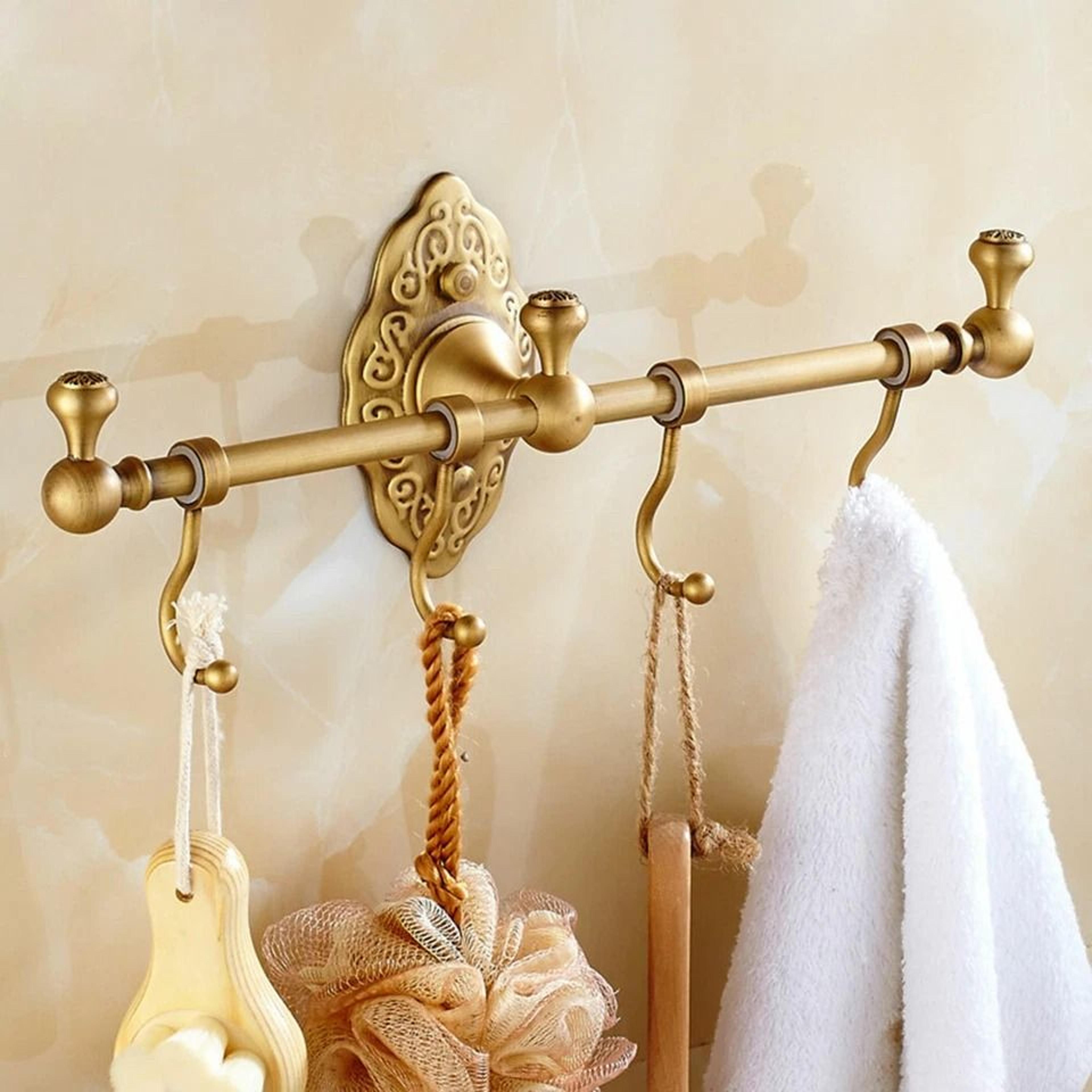 vintage brass towel rack with wall mounted shelf