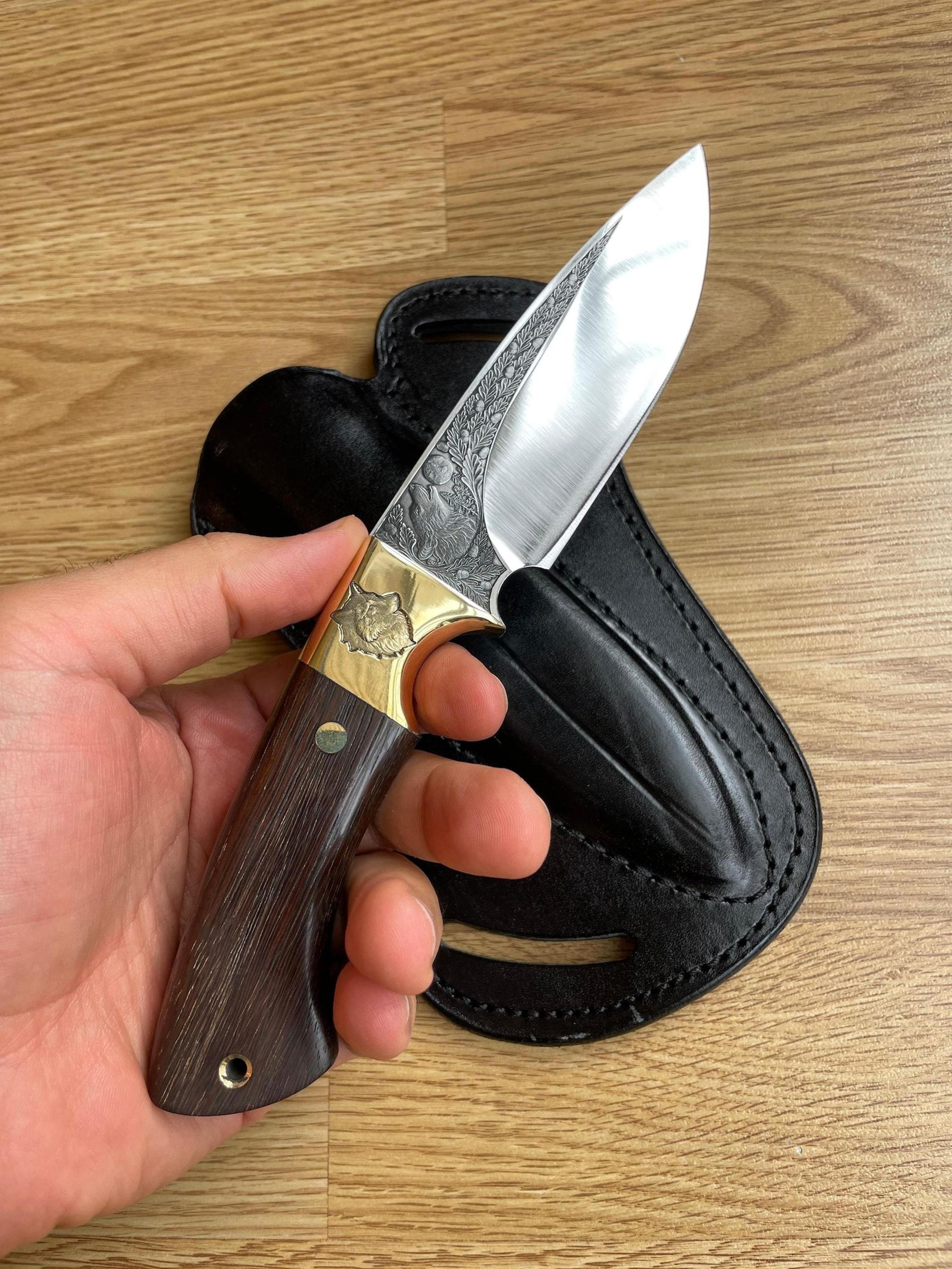 full tang outdoor knife with ebony wood grip & wolf engraved steel blade
