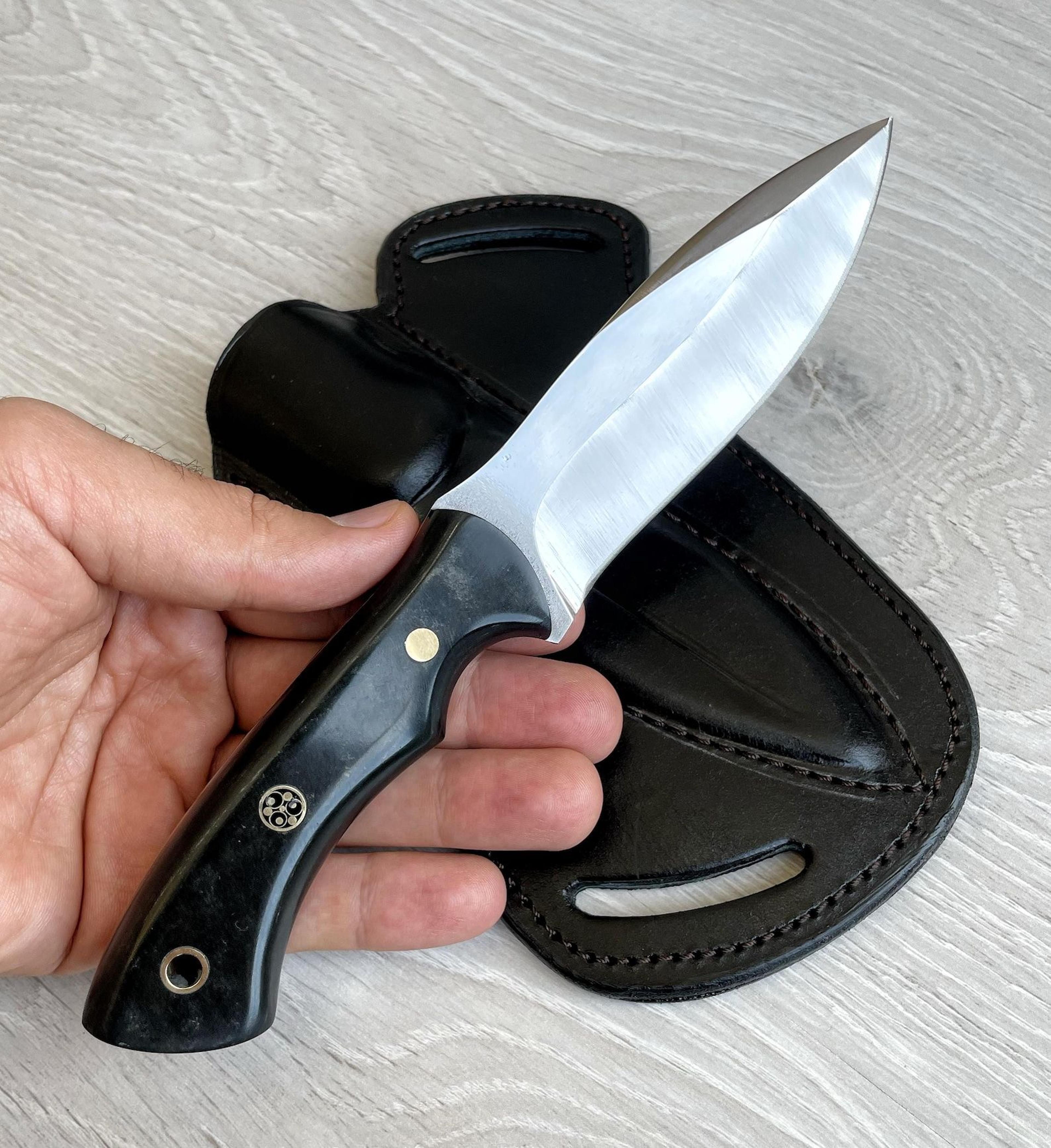bushcraft camping knife with blacksmith forged 1075 carbon steel design