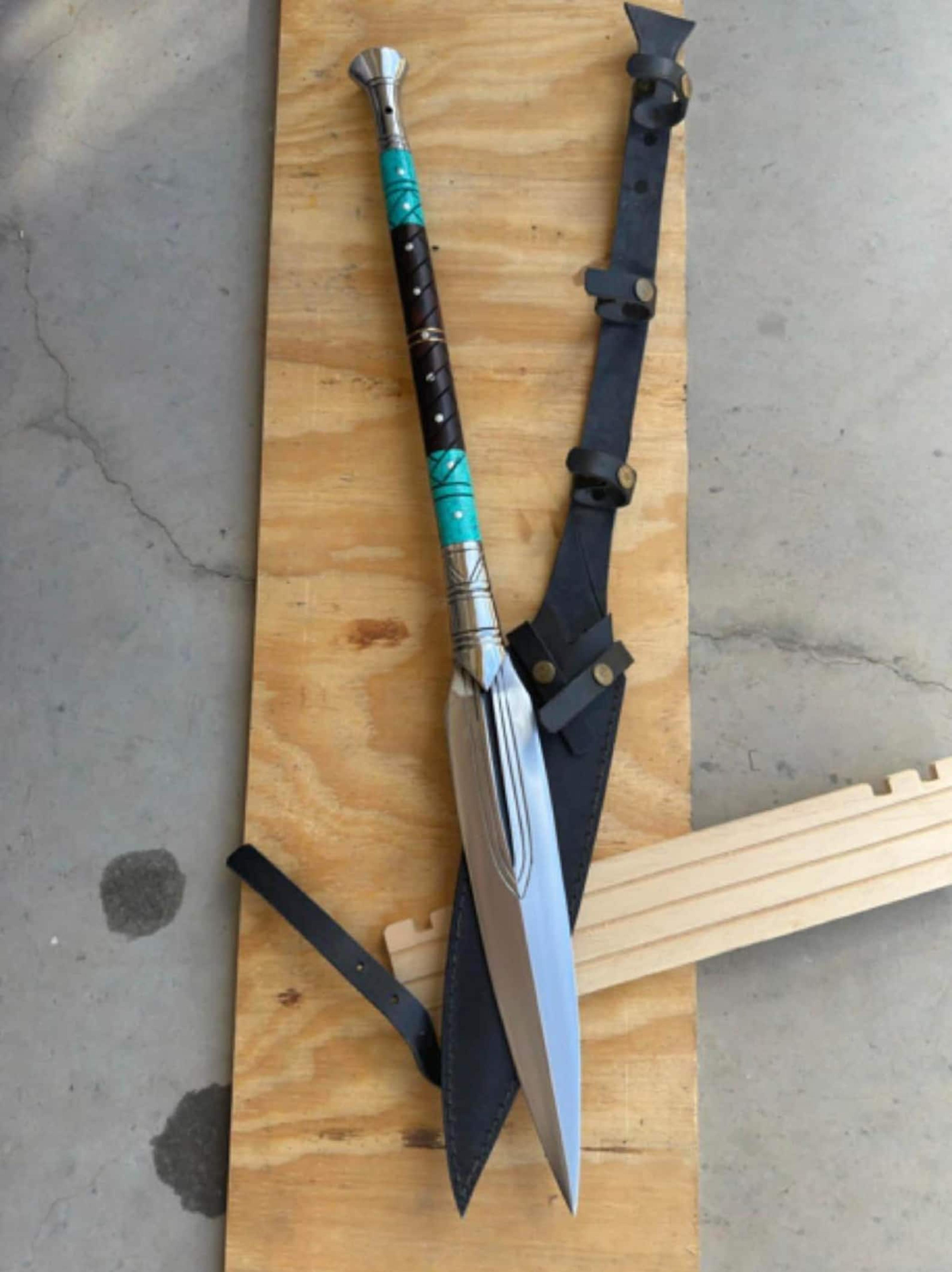 medieval style display spear with rosewood handle and ornamental metal accents