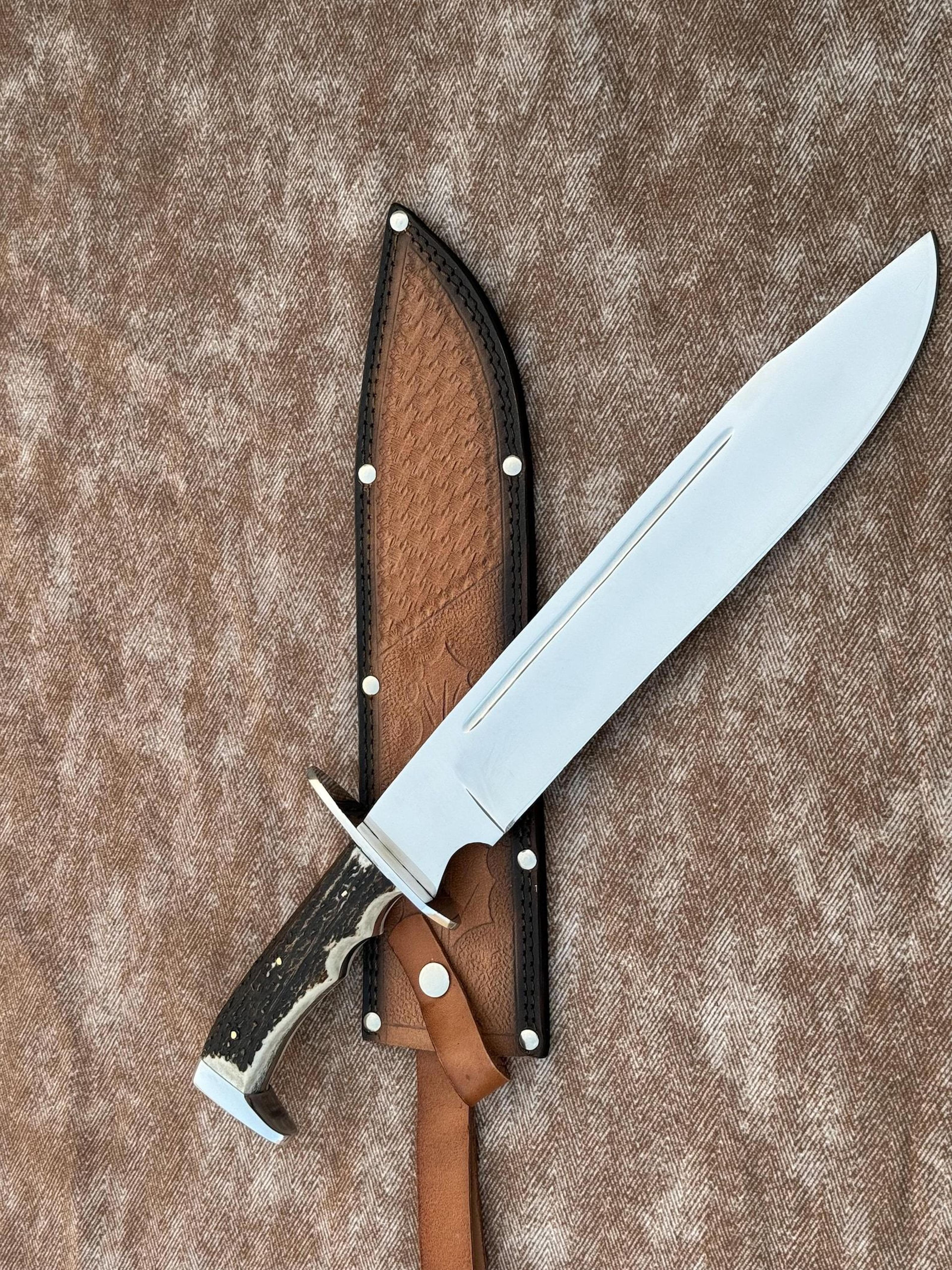handmade high carbon steel bowie knife with antler handle & forged blade