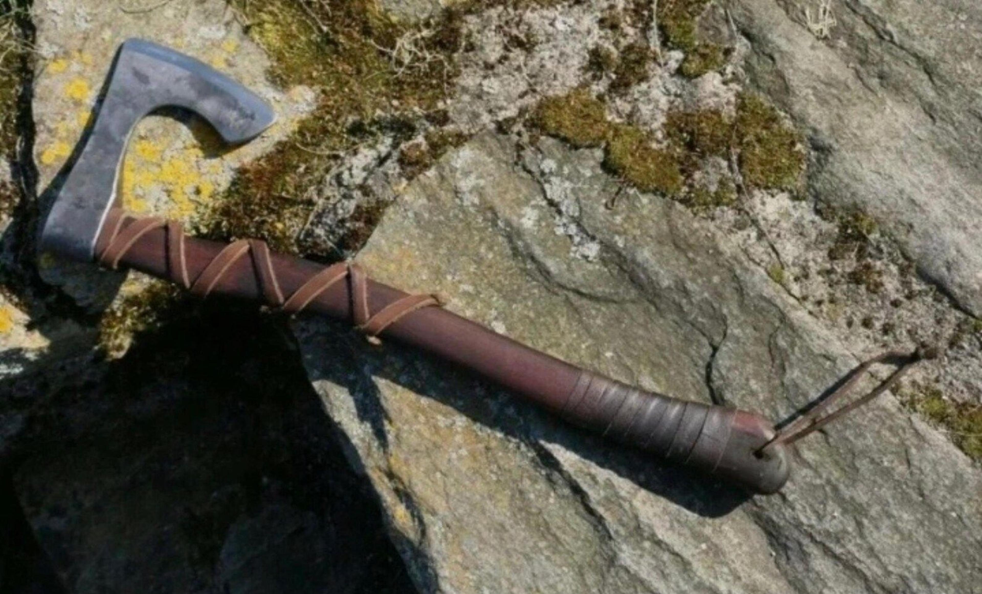 norse inspired carbon steel axe with rosewood handle