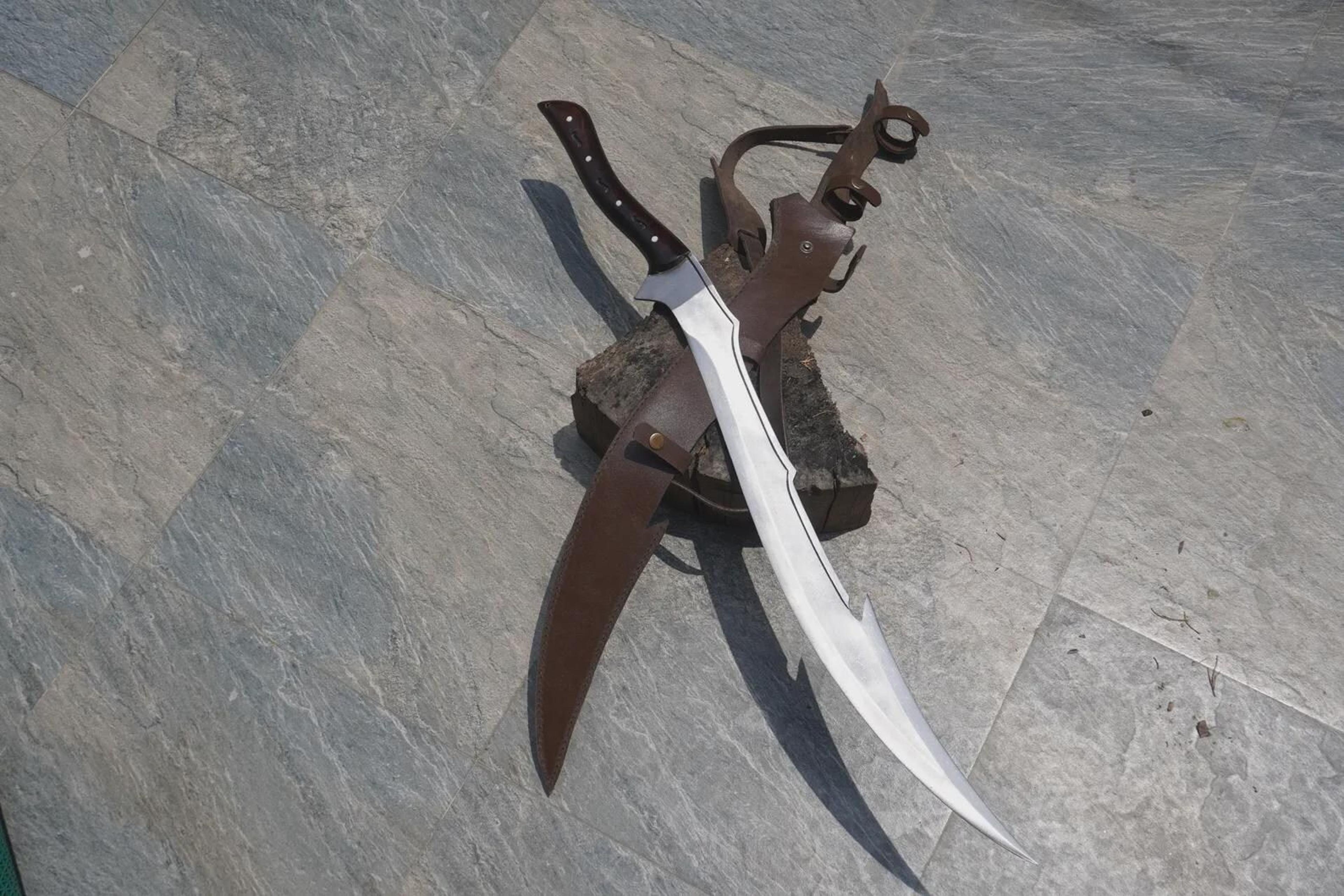 handcrafted carbon steel double edged sword with leather sheath, inspired by himalayan metalworking tradition