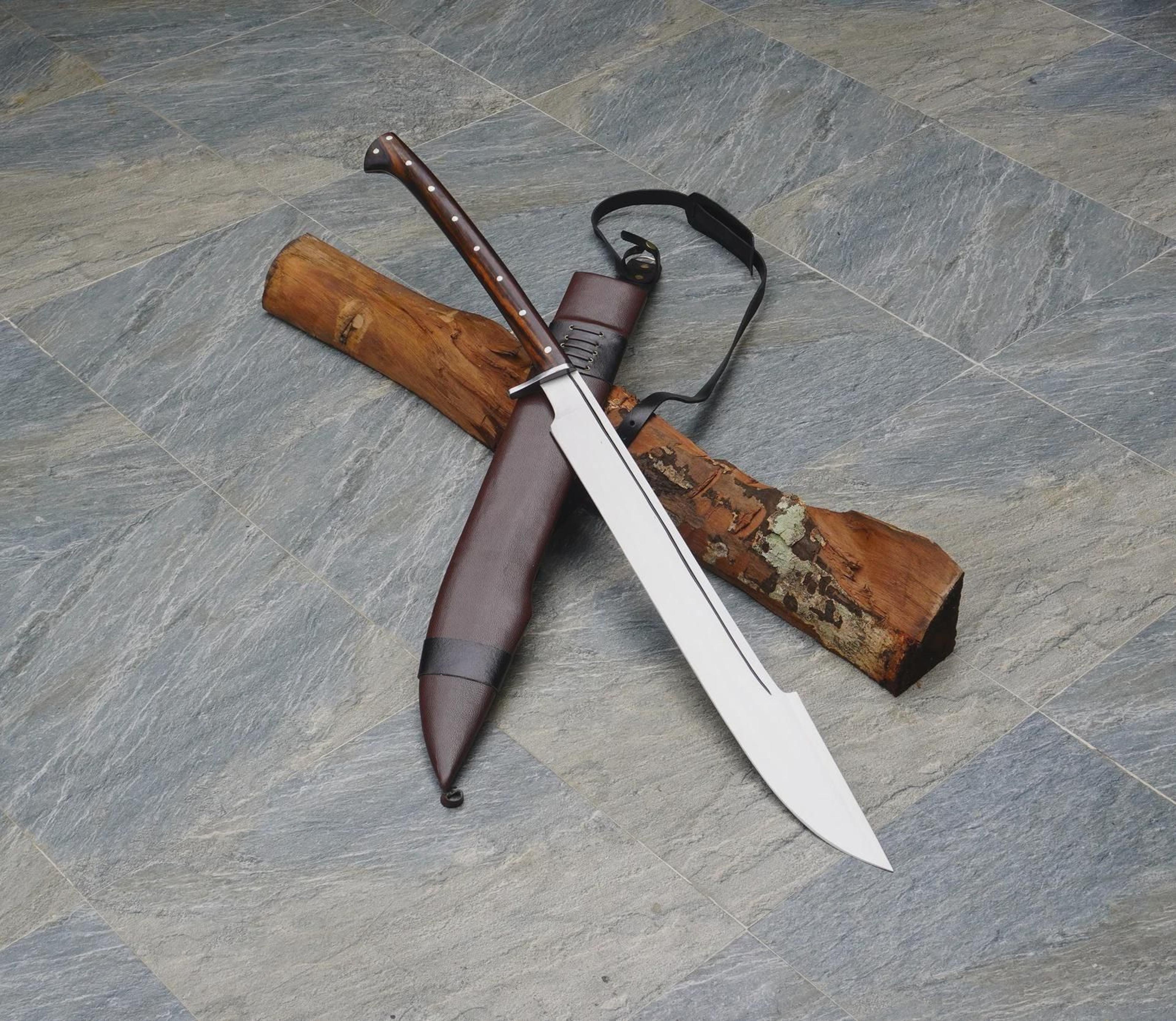 handcrafted double-edged carbon steel sword with leather sheath and himalayan heritage