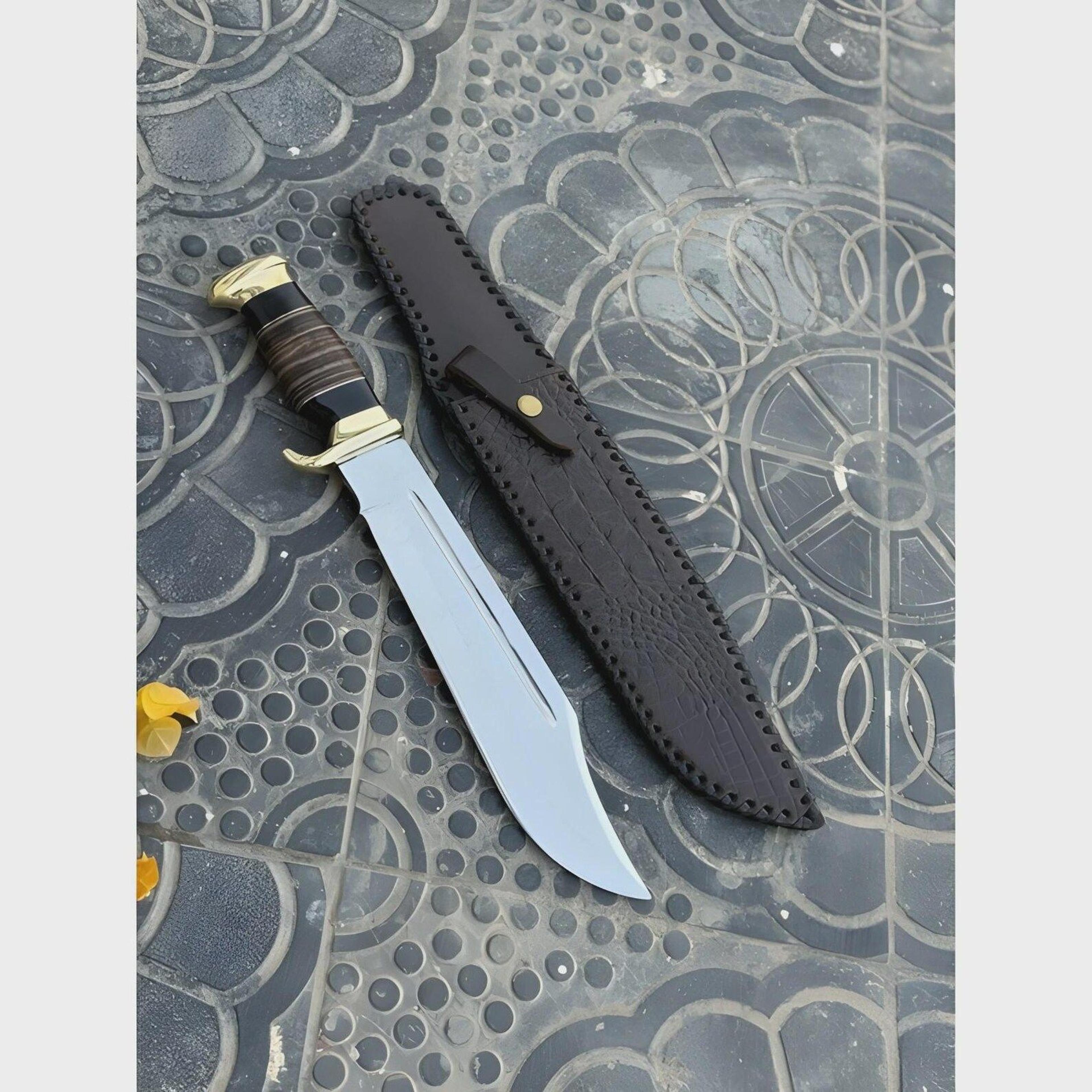 handcrafted j2 steel bowie knife with leather wrap and brass guard - perfect for outdoor enthusiasts and collectors