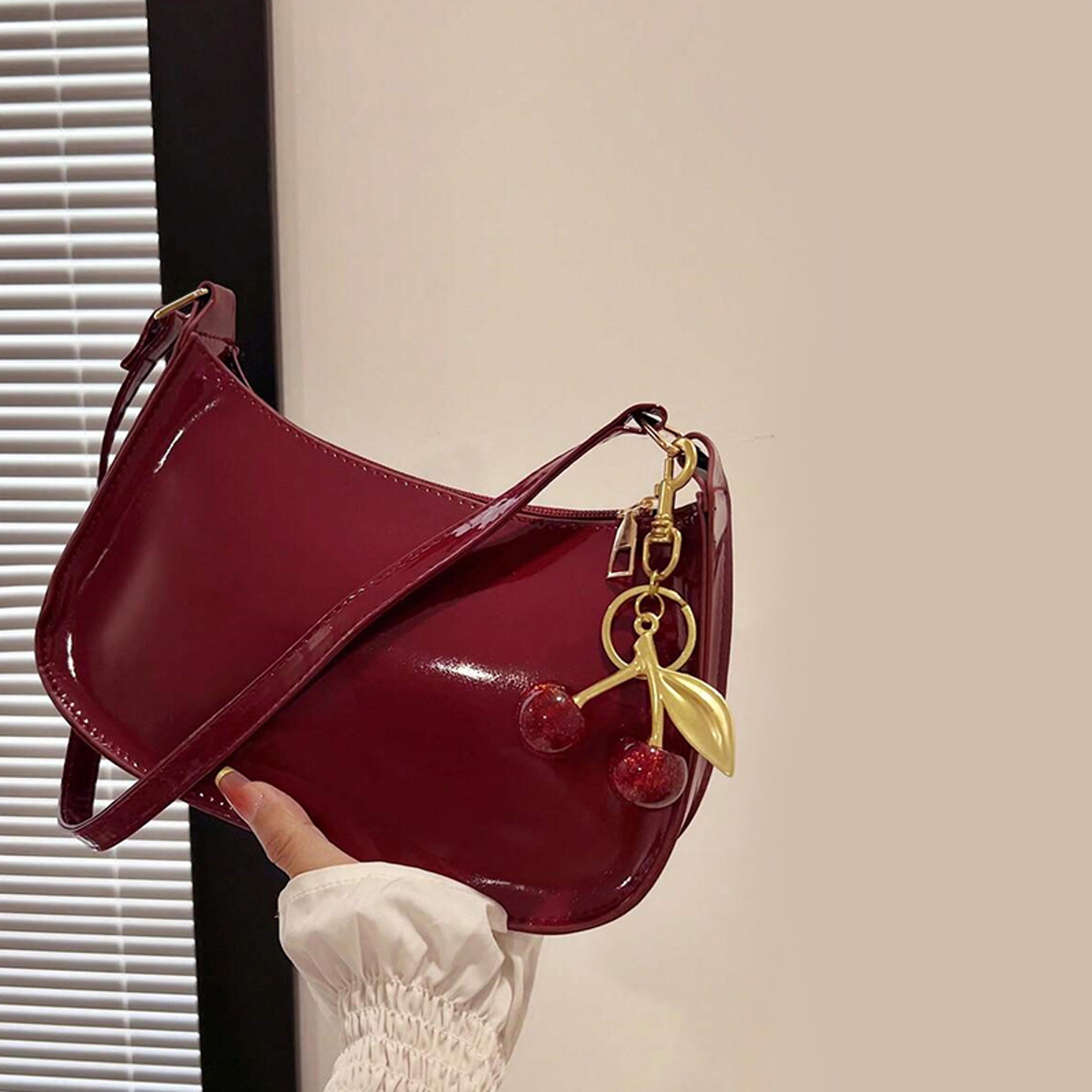 cherry charm leather handbag for women stylish shoulder bag for everyday commuting