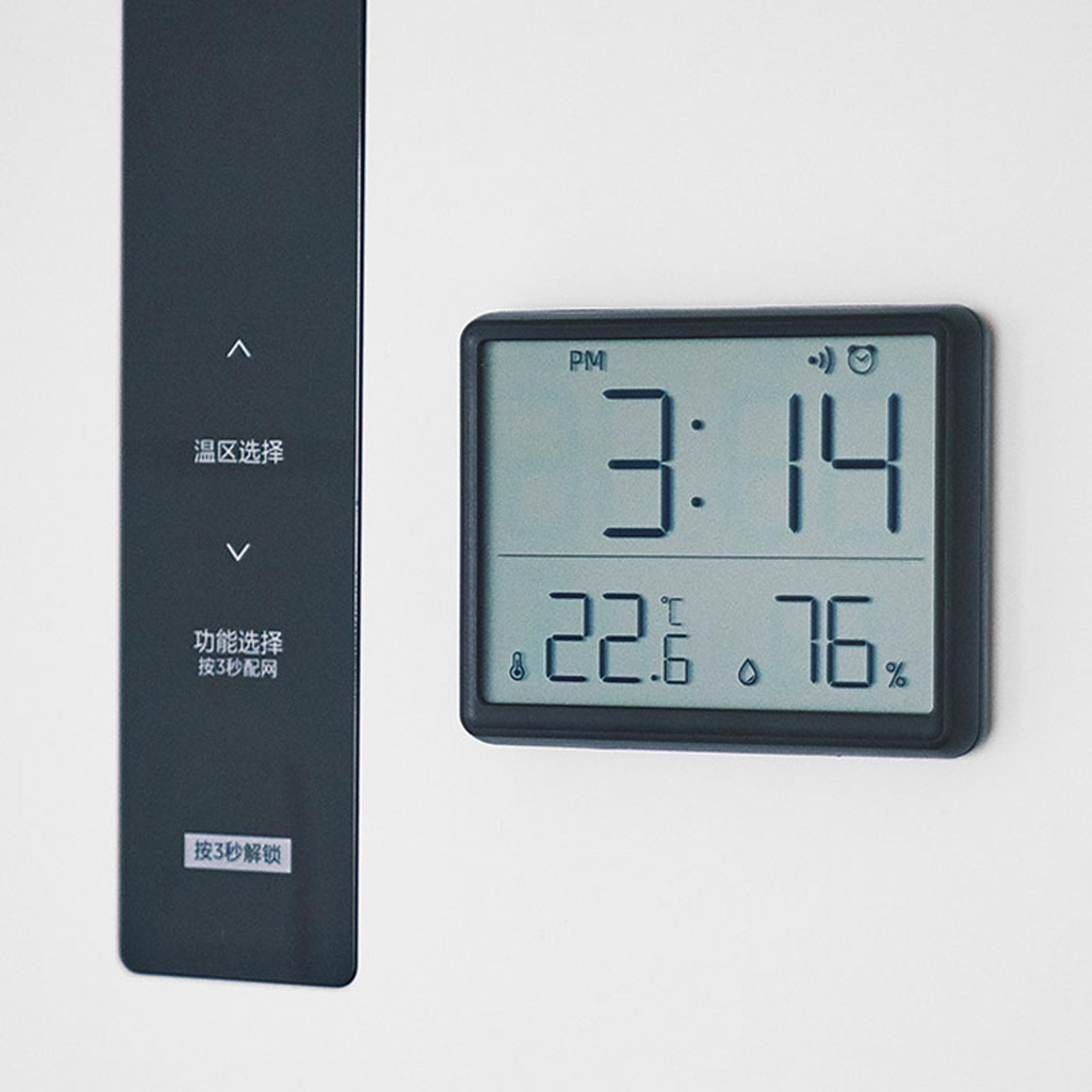 ultra thin digital alarm clock with temperature hygrometer & large lcd magnetic wall display