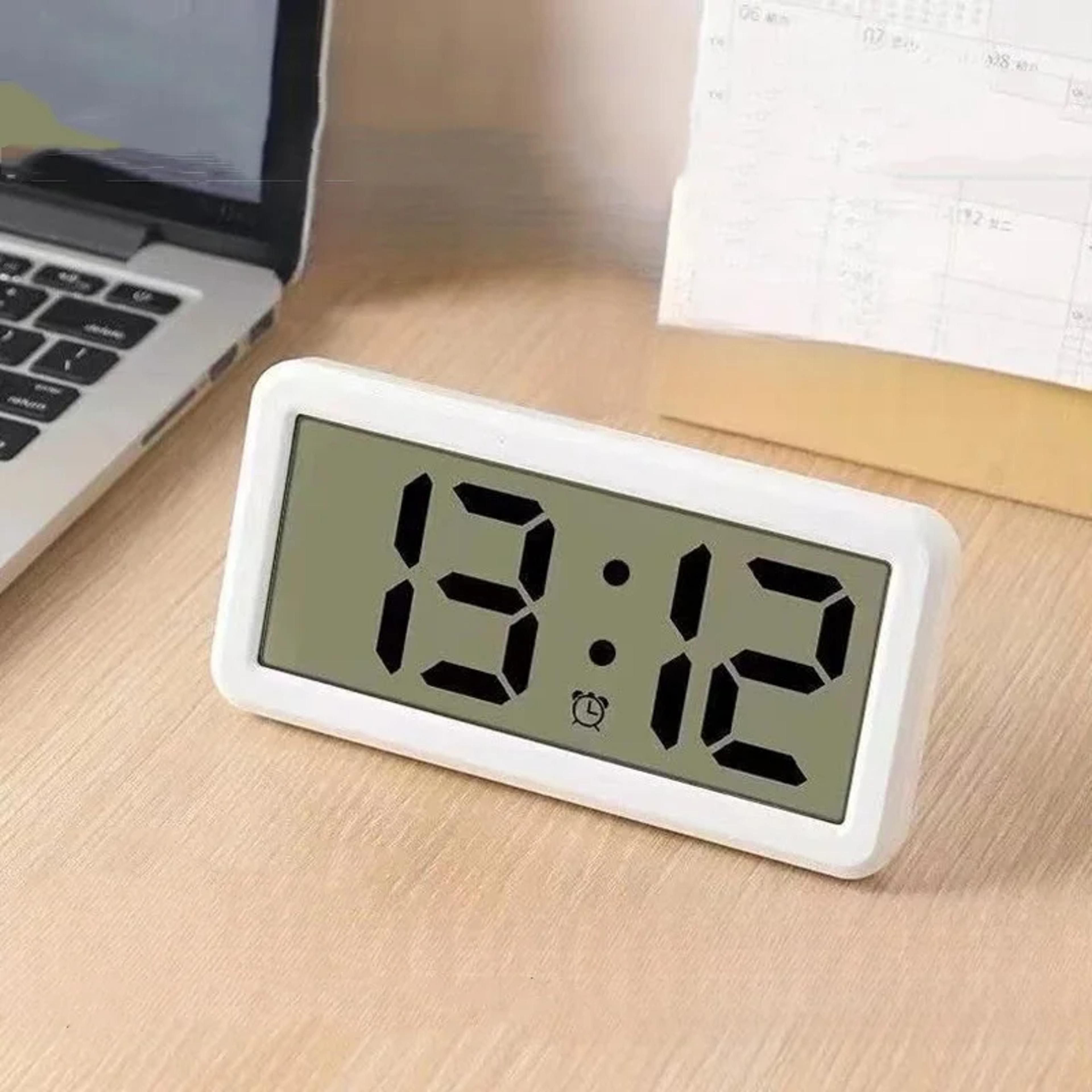 battery powered digital alarm clock with lcd time & date display, snooze, desk & wall clock
