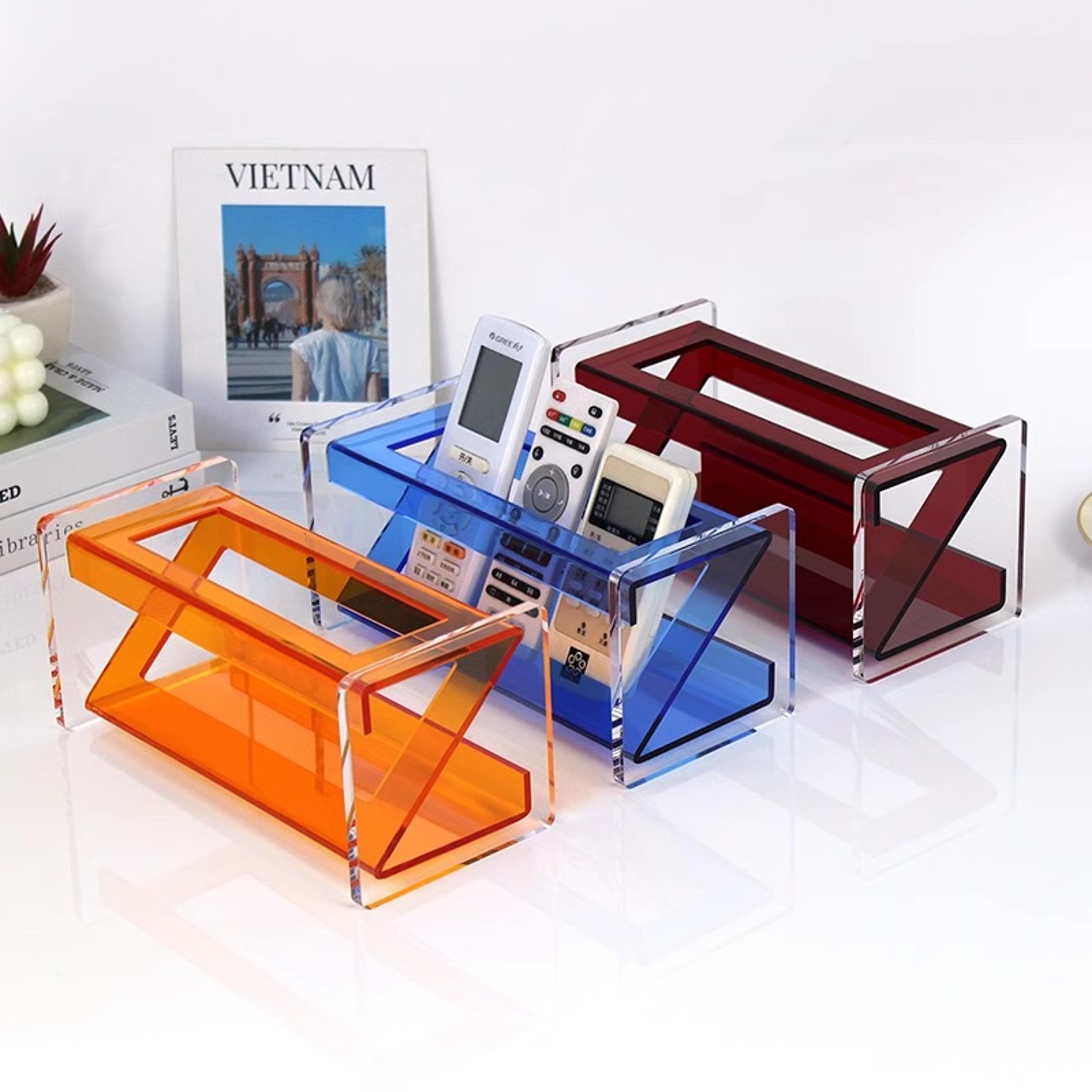 modern acrylic remote control holder and coffee table organizer for remotes and everyday essentials