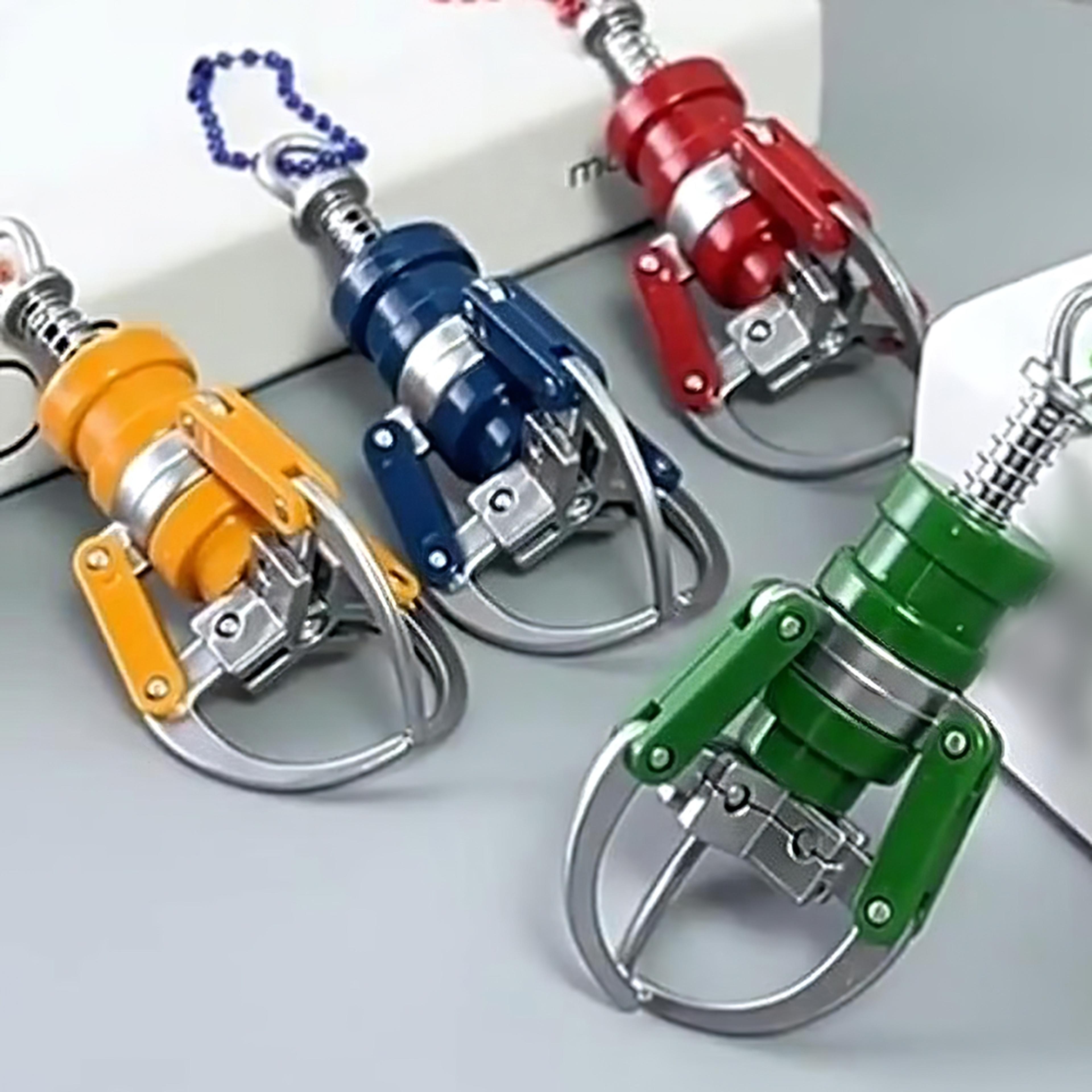 mini claw machine keychain fingertip gripper and cute bag charm