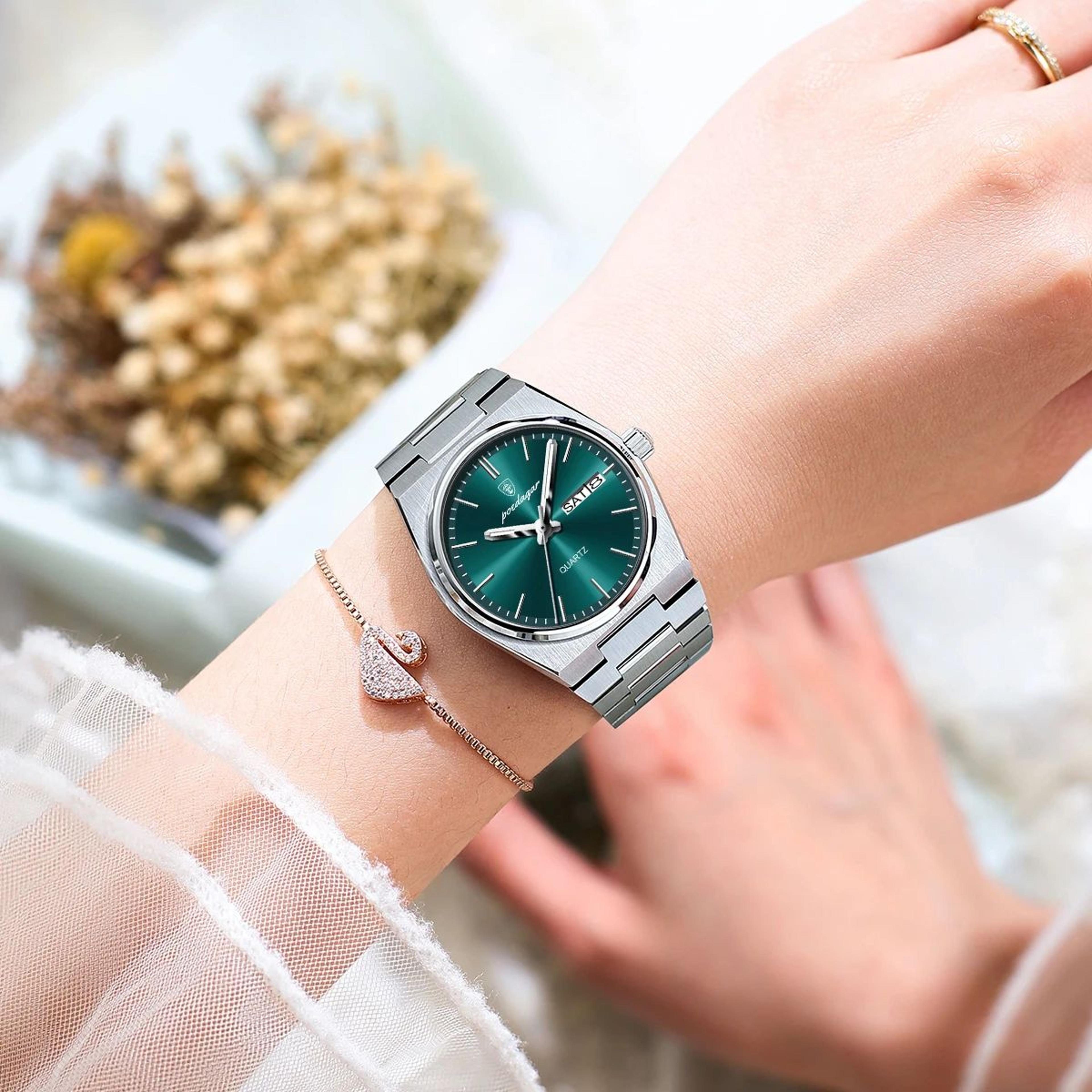 elegant luminous quartz watch for women with stainless steel band and day date display