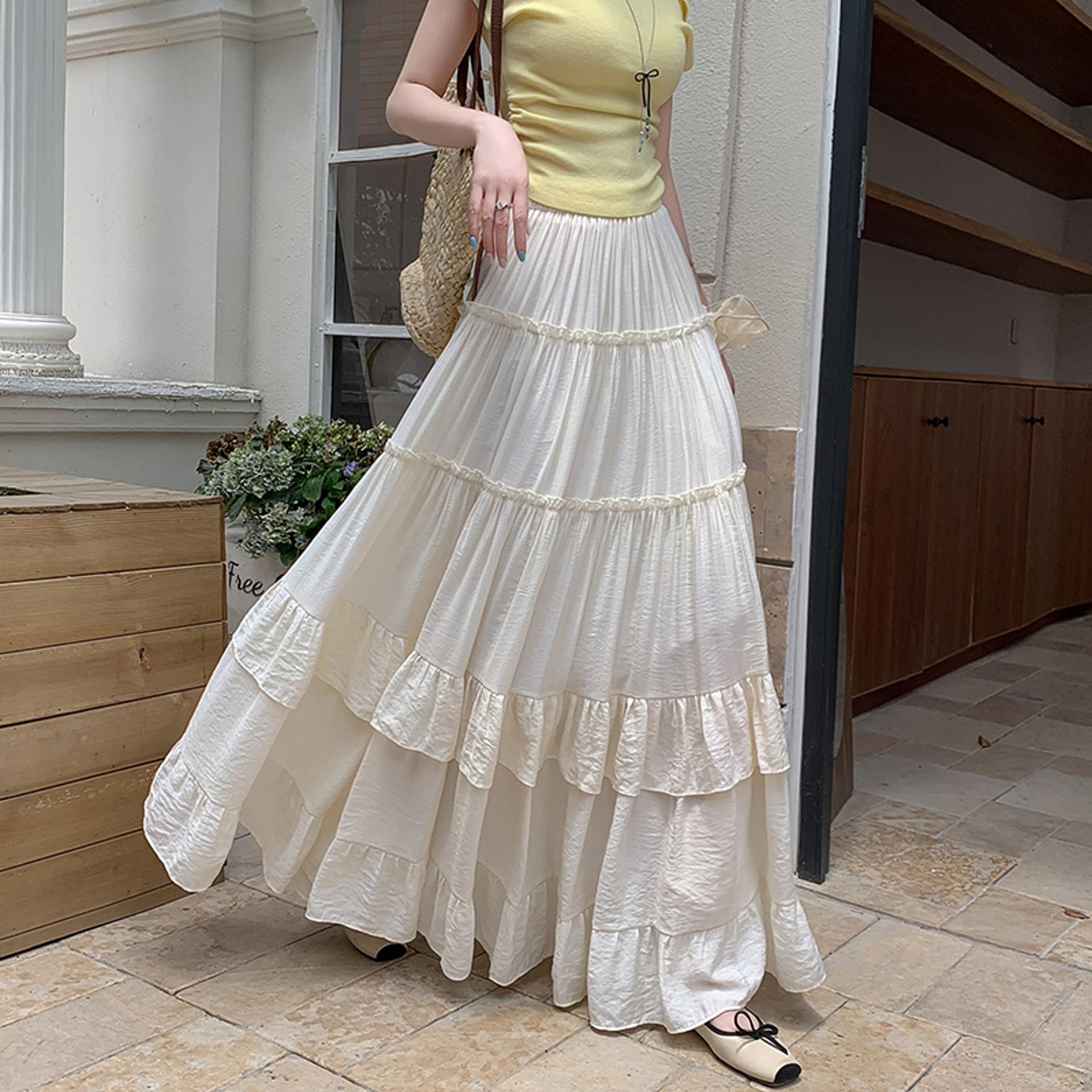 Romantic ruffled maxi skirt with soft wavy hair