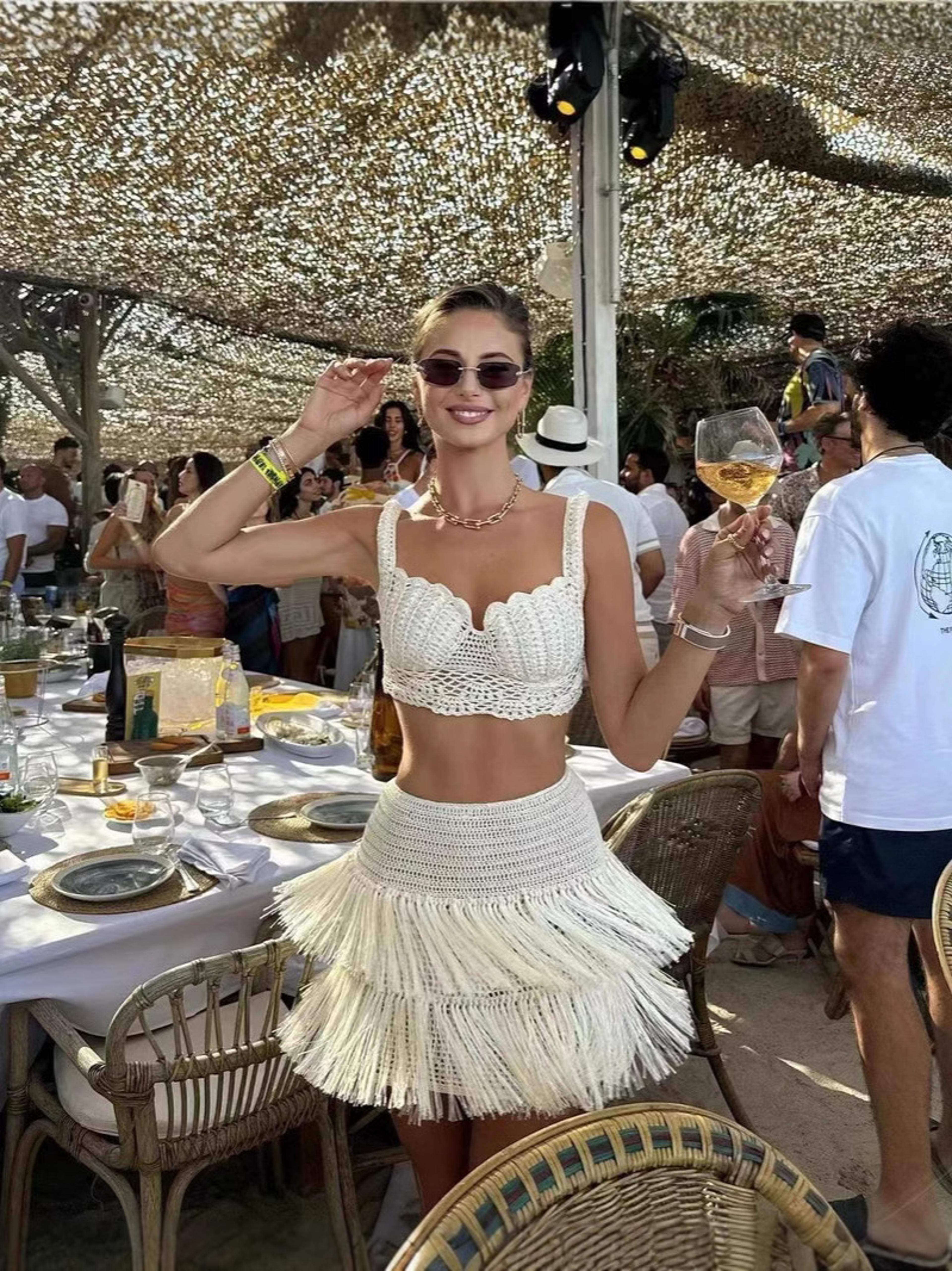 handmade crochet two piece skirt outfit – boho vacation matching set with tassel crop top and hollow skirt