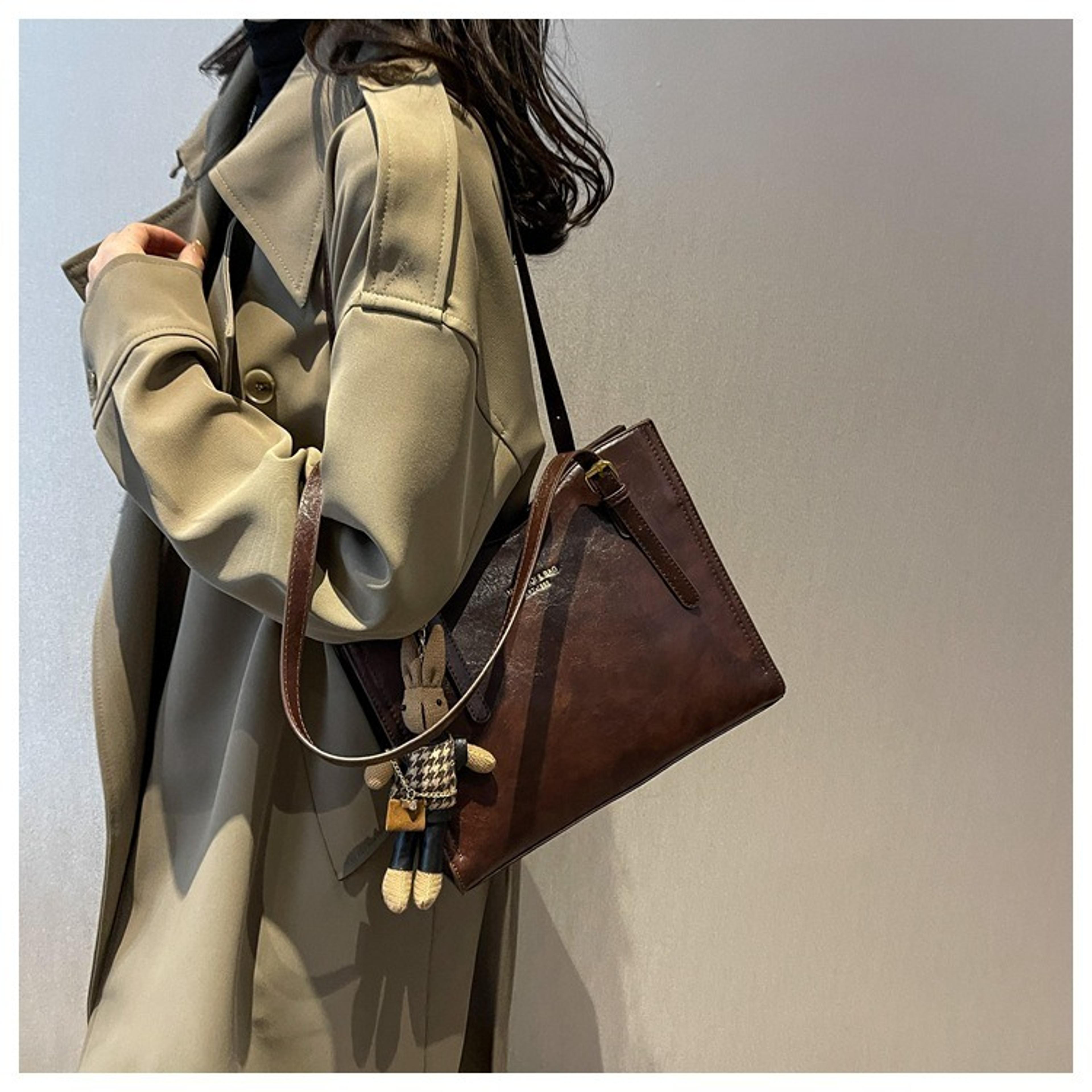vintage inspired slouchy tote bag with pendant