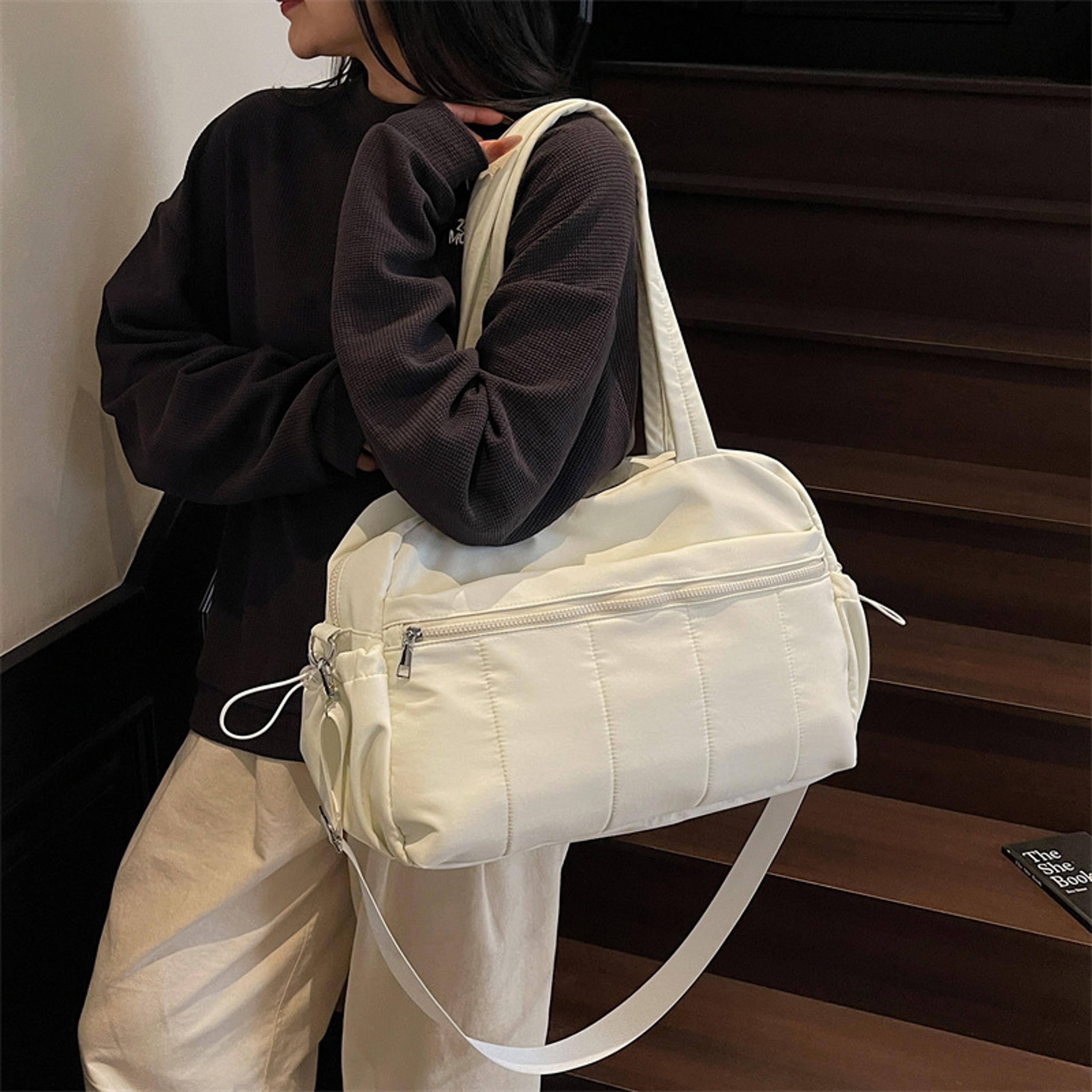 versatile waterproof travel duffel and wet dry gym bag for women
