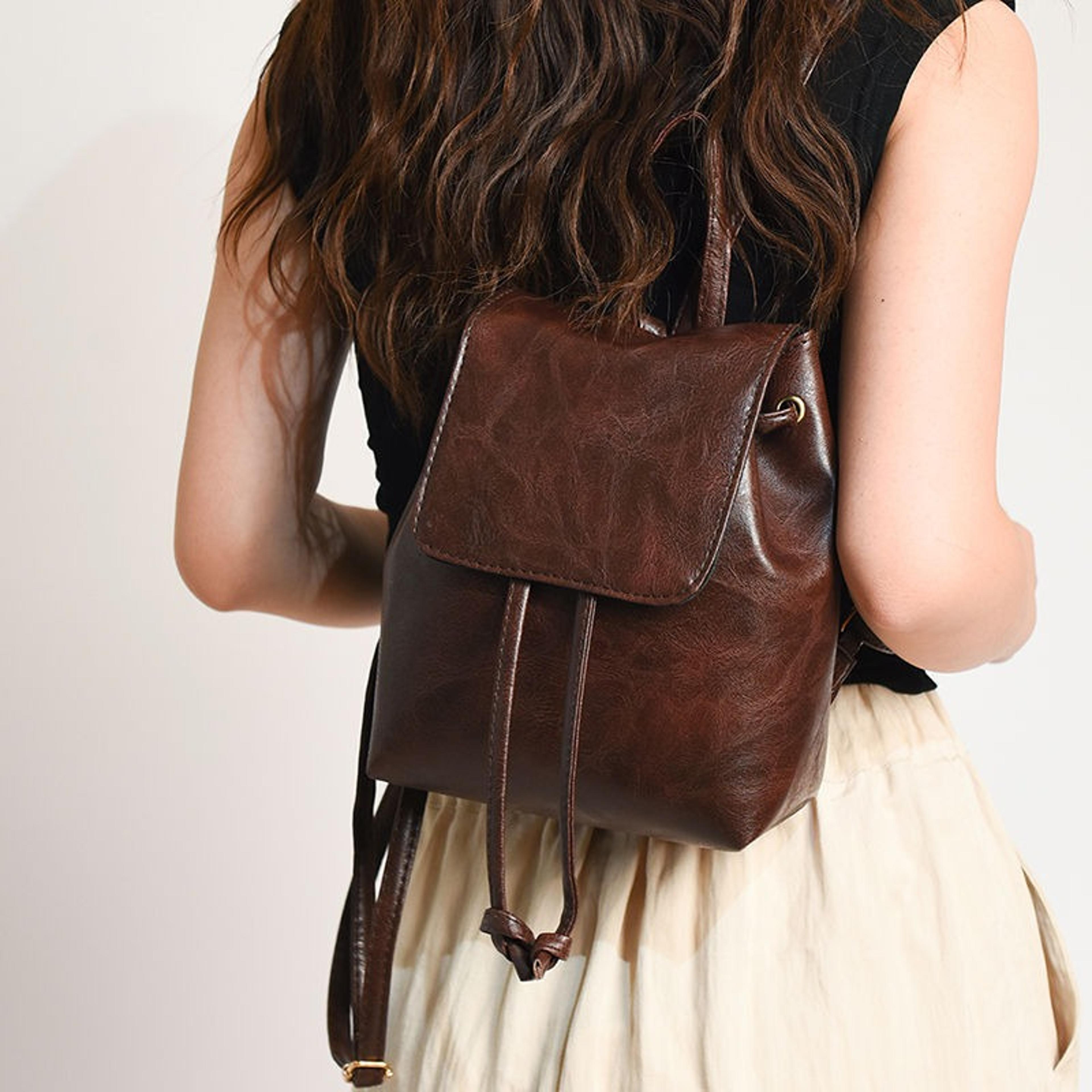 vintage brown minimalist women's backpack: artistic drawstring rucksack