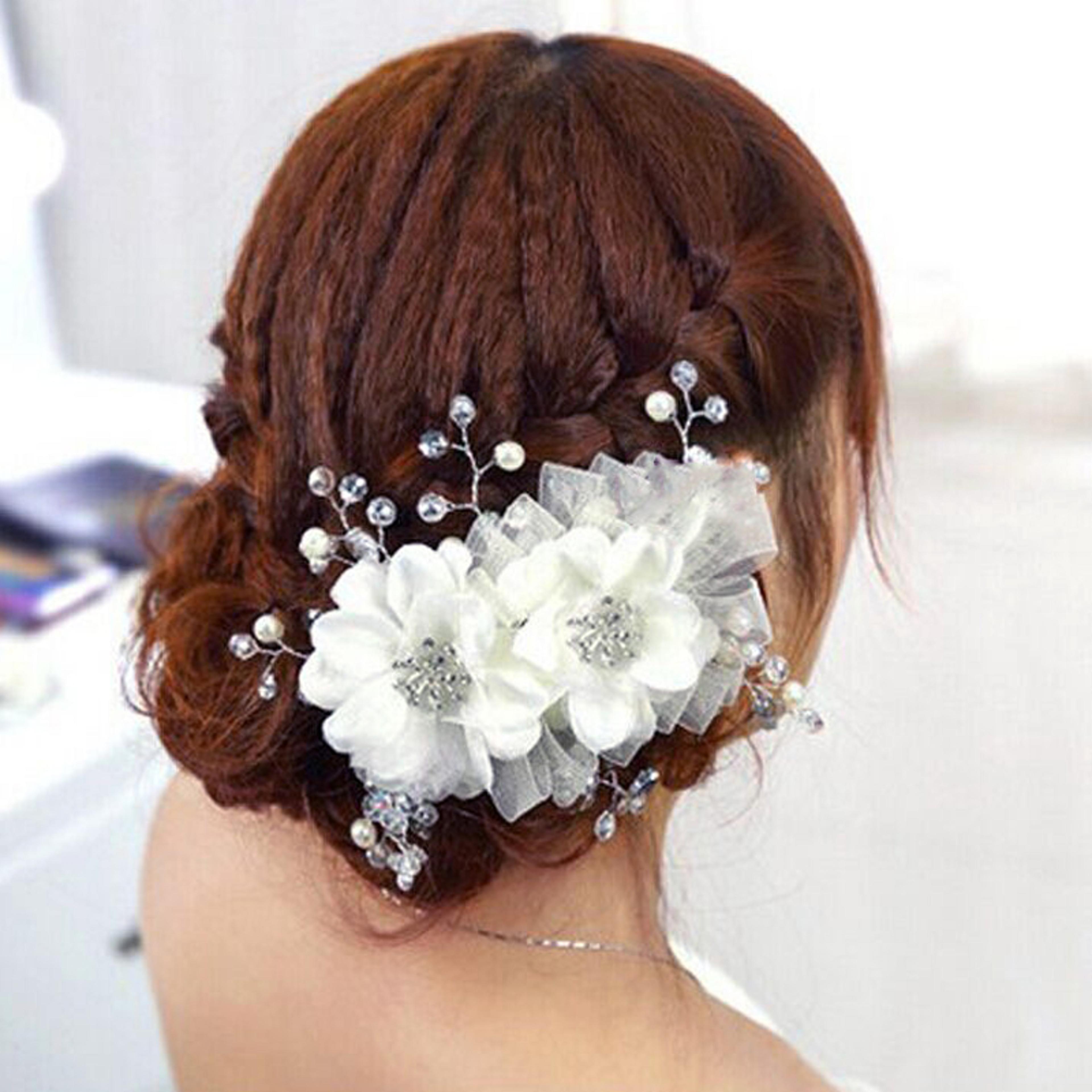 handmade white flower bridal headpiece with pearl and crystal beaded accents for elegant wedding hair styling