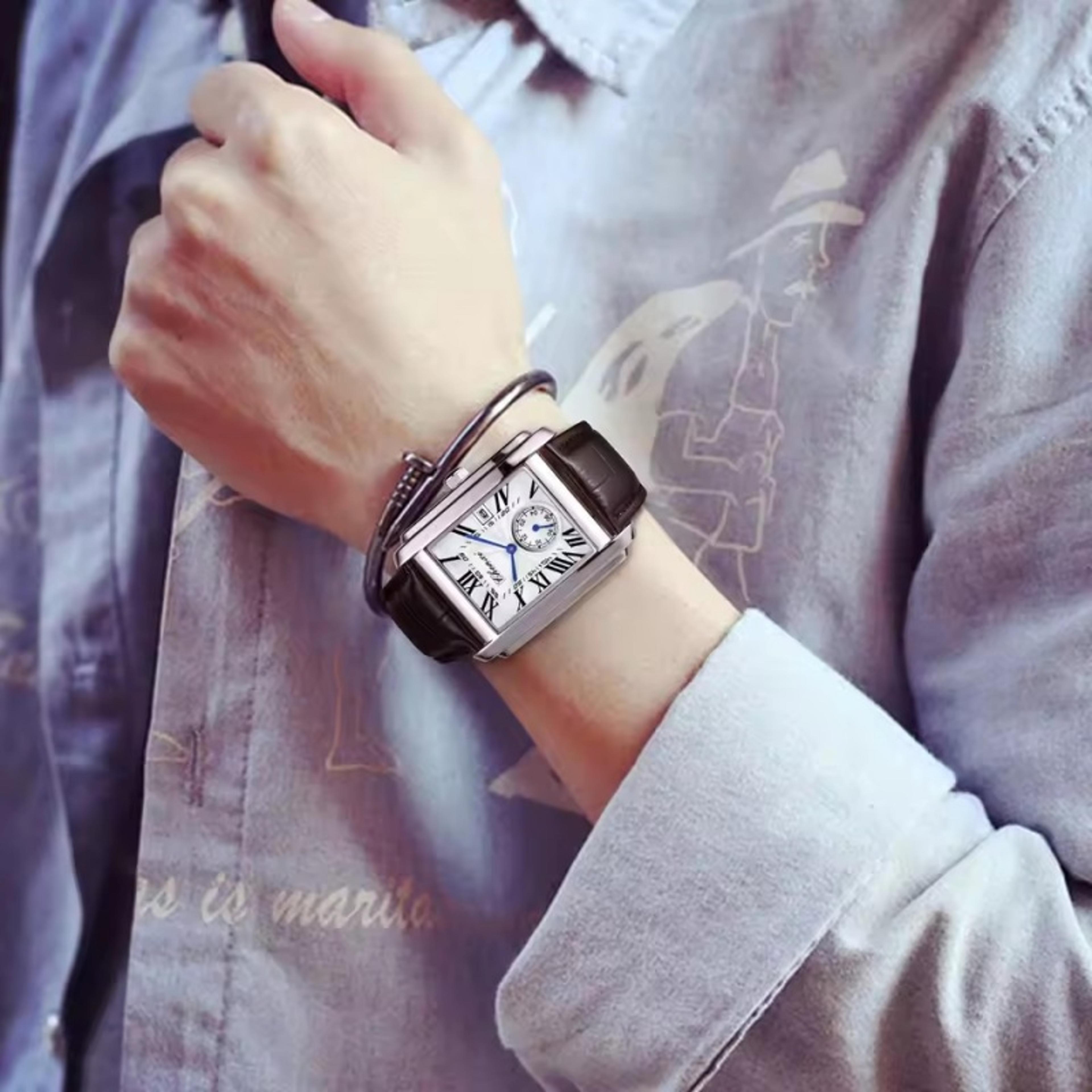 elite business quartz watch with leather strap and calendar