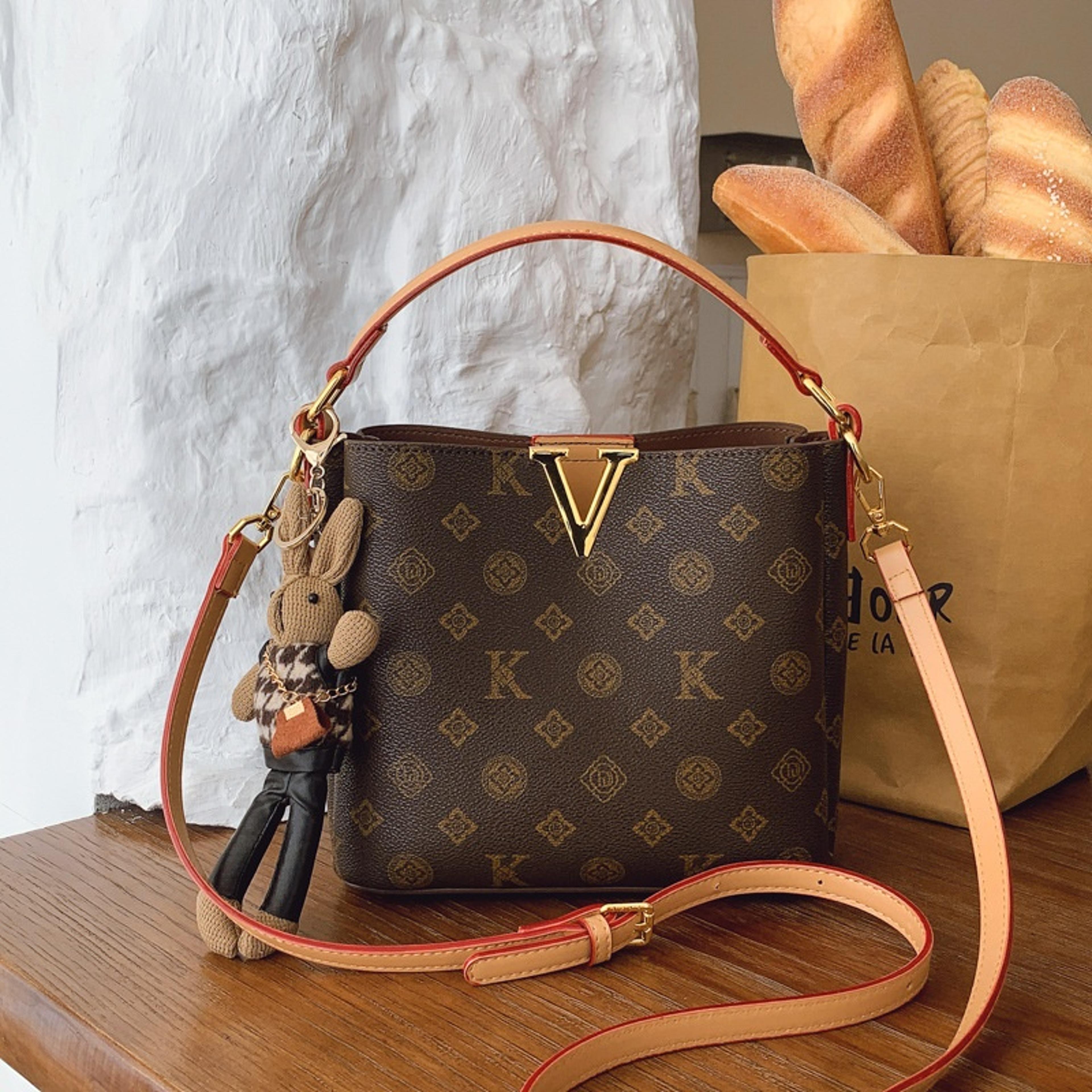 khaki monogram pu leather bucket bag with luxury v-shaped design
