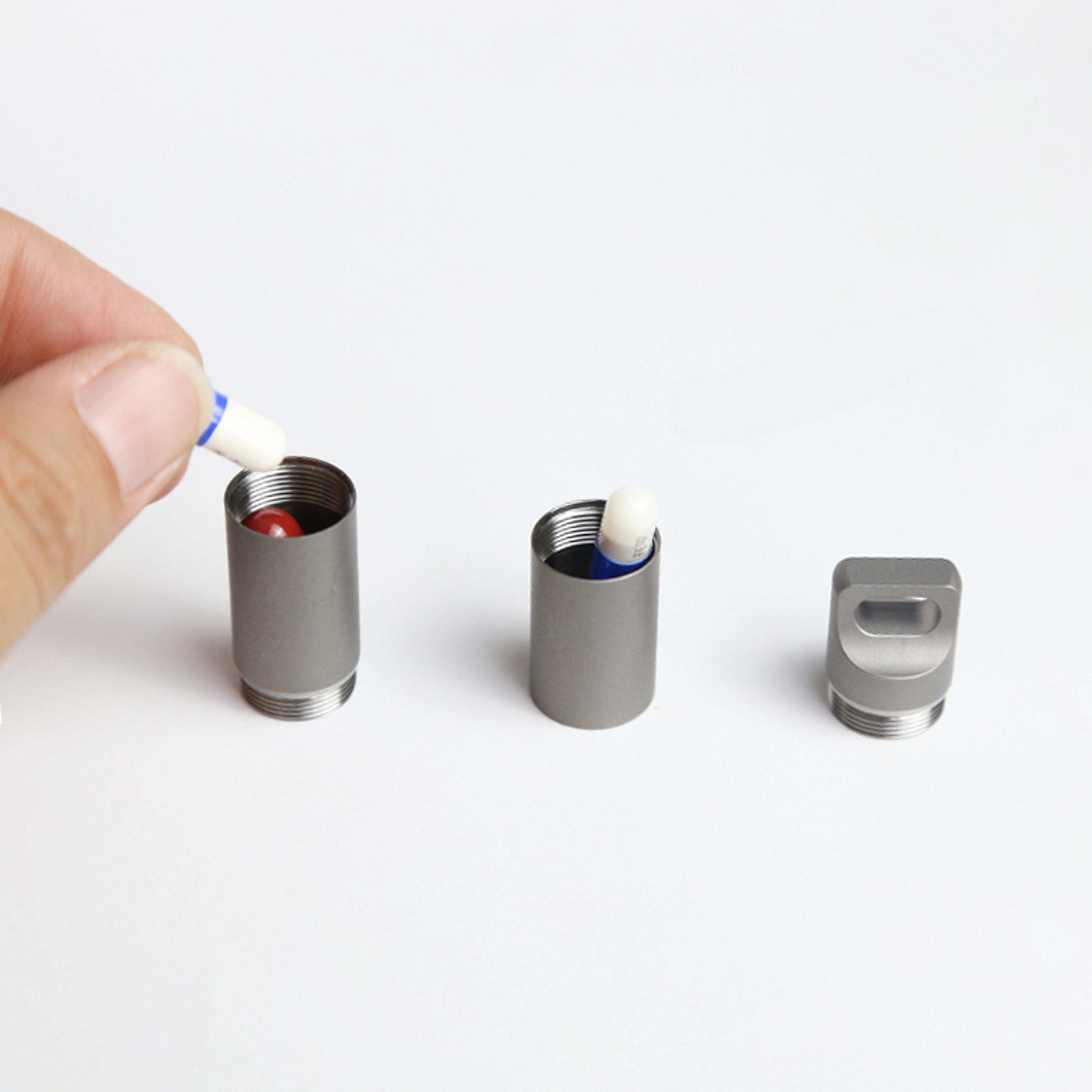 titanium pill case keychain waterproof portable medicine storage bottle
