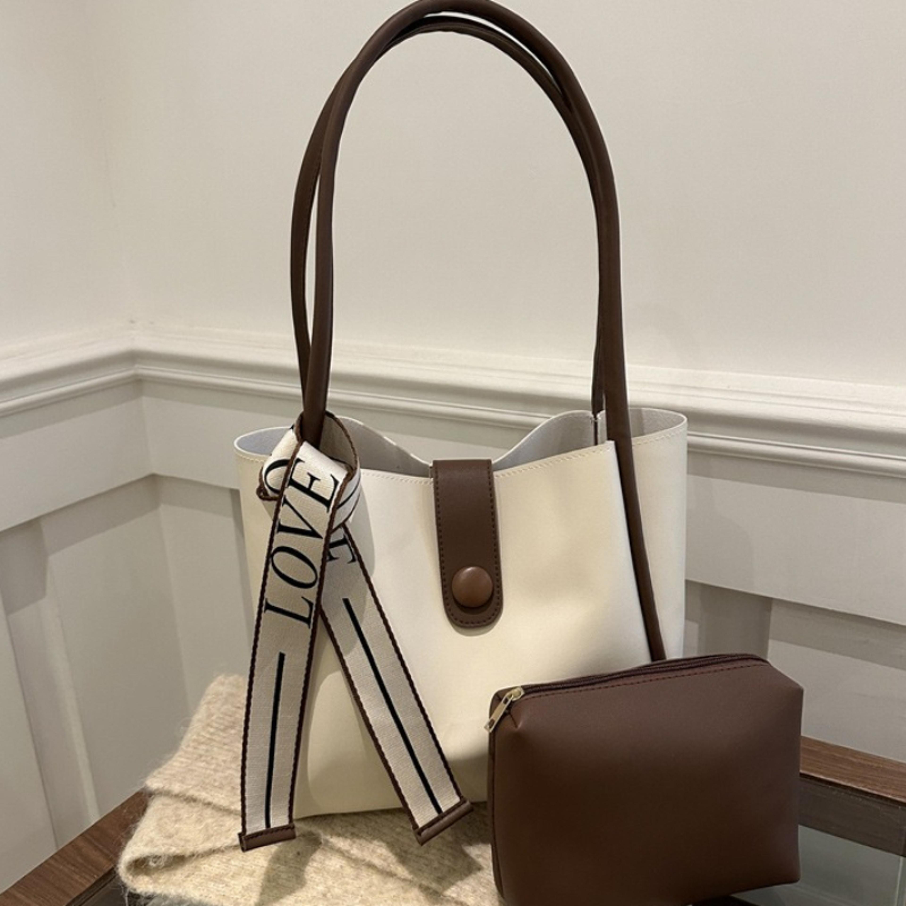 minimalist faux leather tote bag with adjustable strap for women