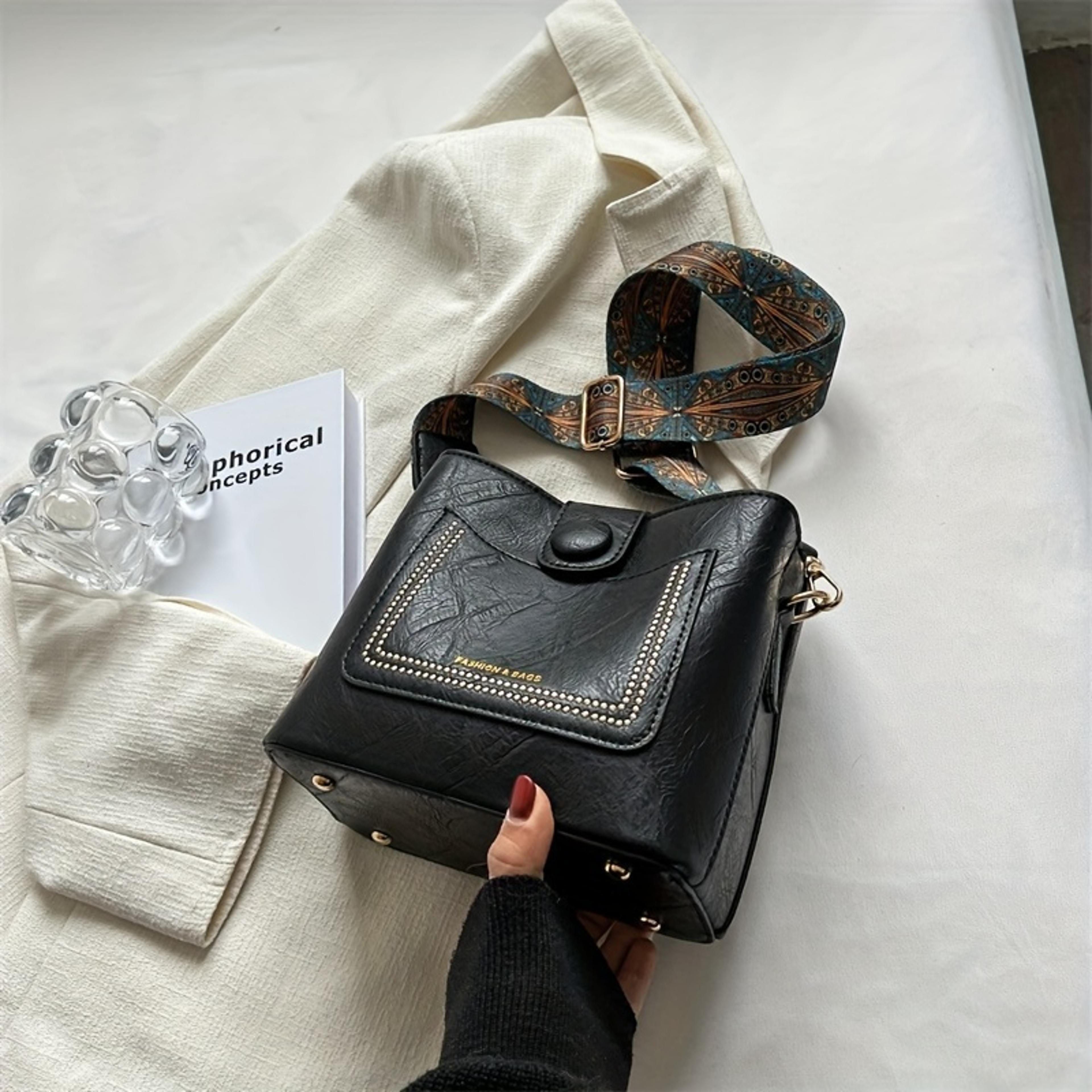 vintage faux leather crossbody bag for women with wide printed strap and bunny charm