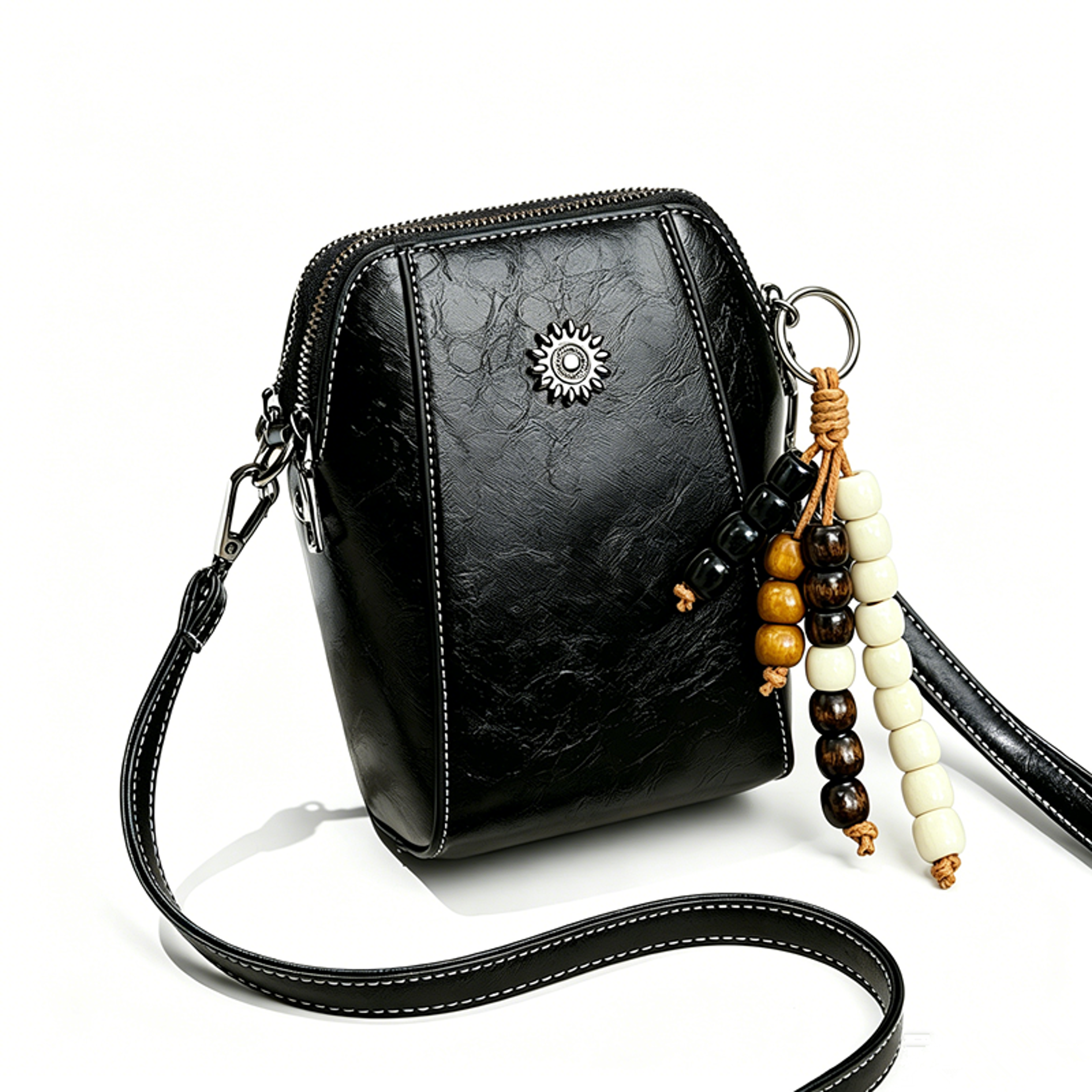 vintage boho phone crossbody bag with faux leather finish and beaded charm