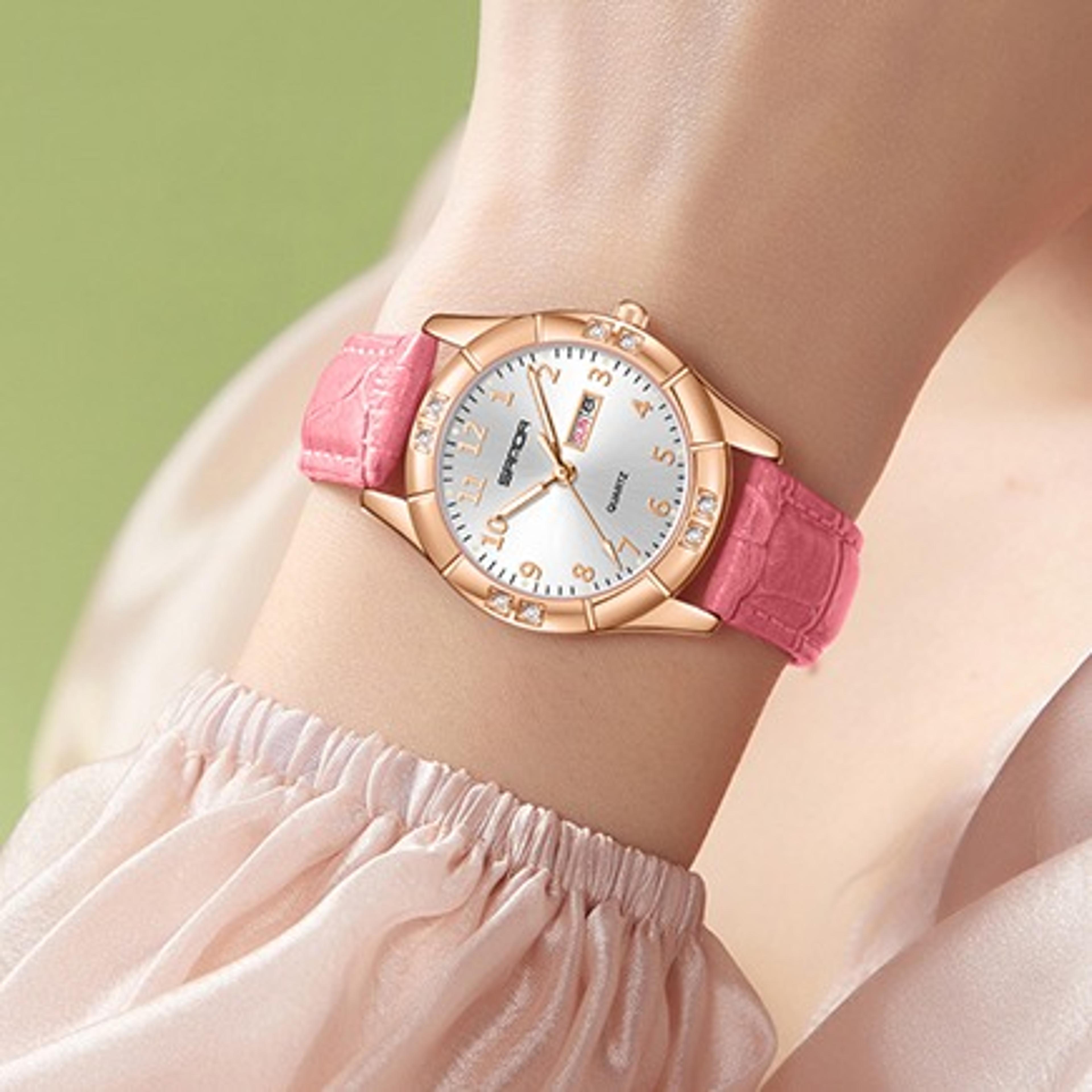 womens quartz watch with leather strap, dual calendar and water resistance