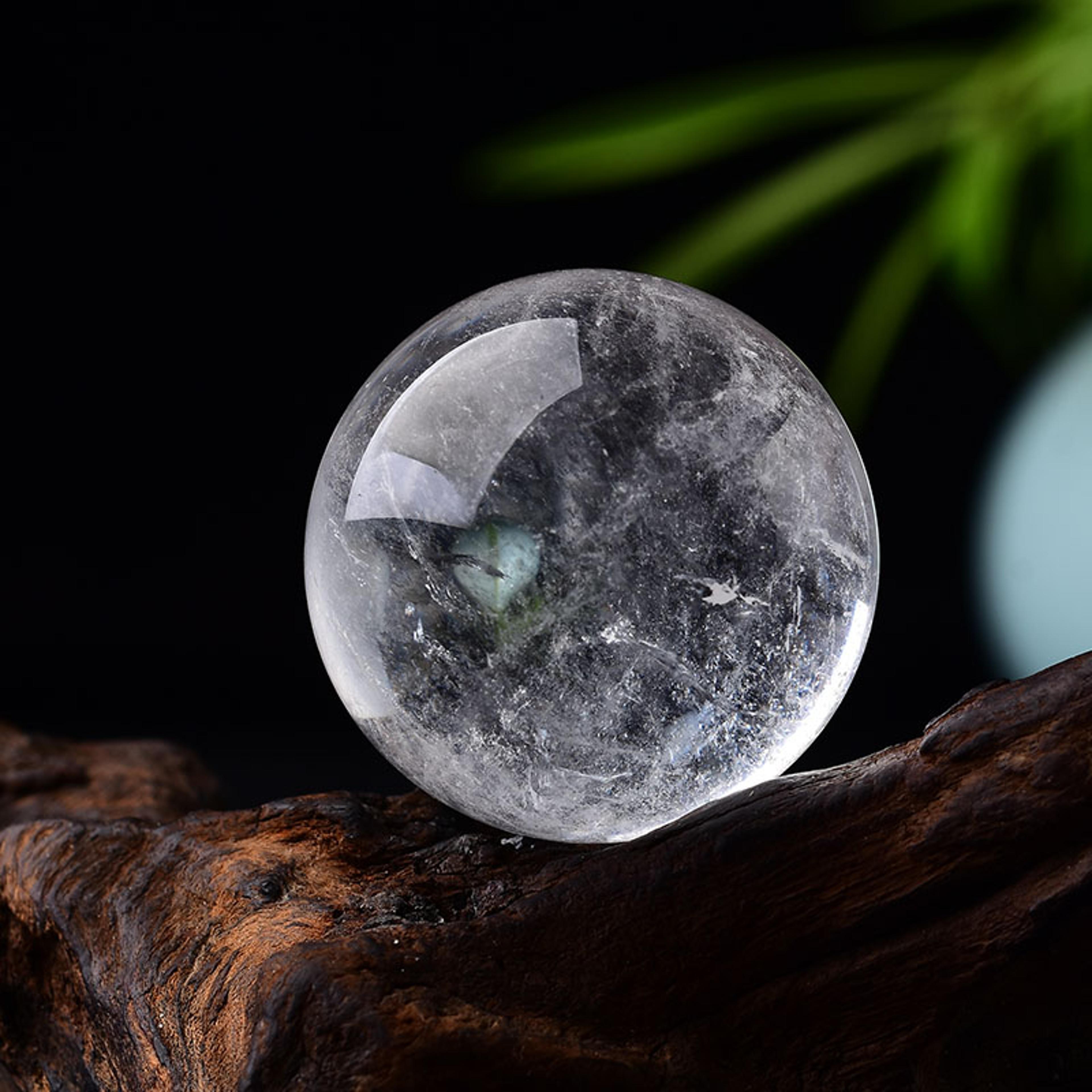 natural clear quartz crystal ball meditation sphere with wooden stand