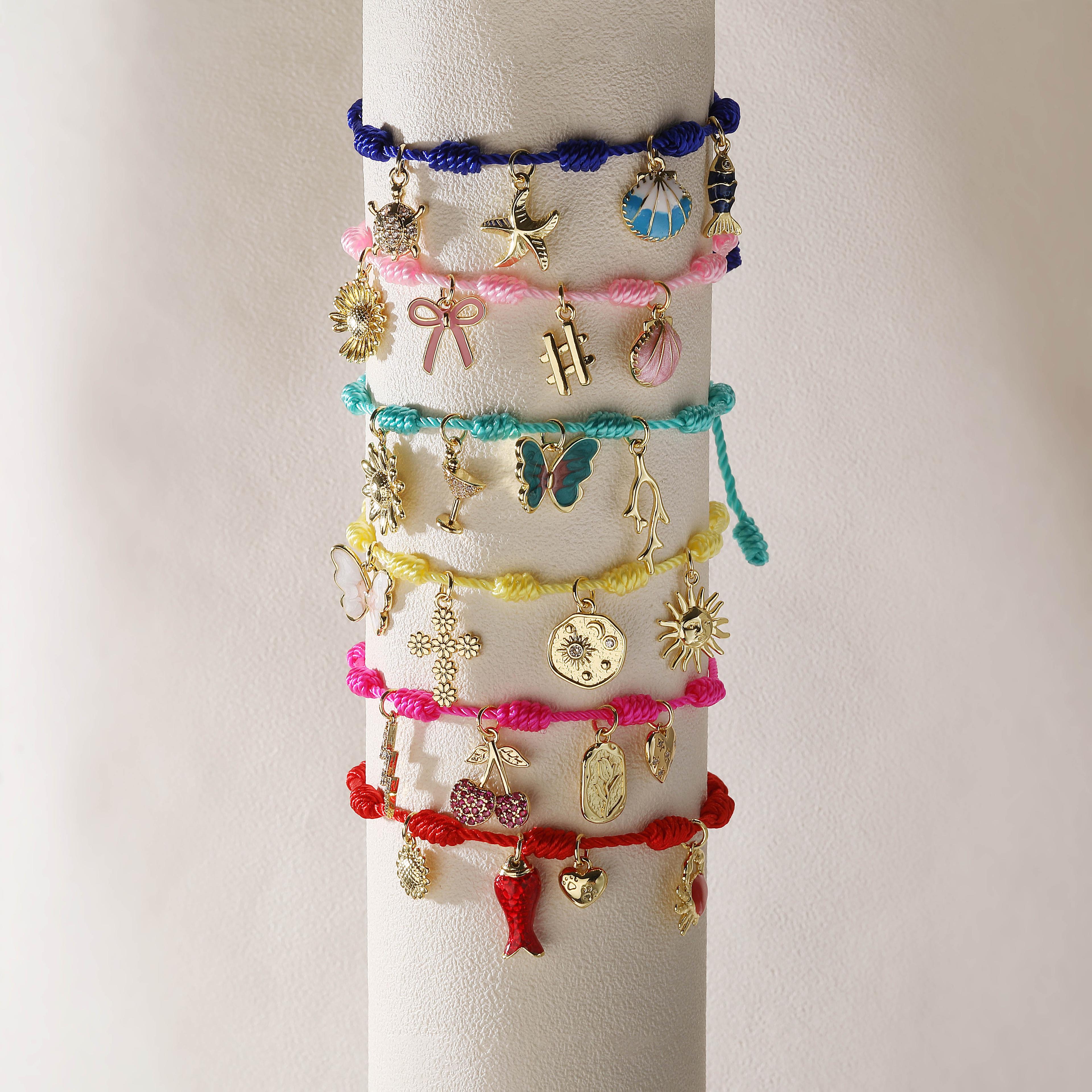 gold plated boho ocean charm bracelet with colorful rope