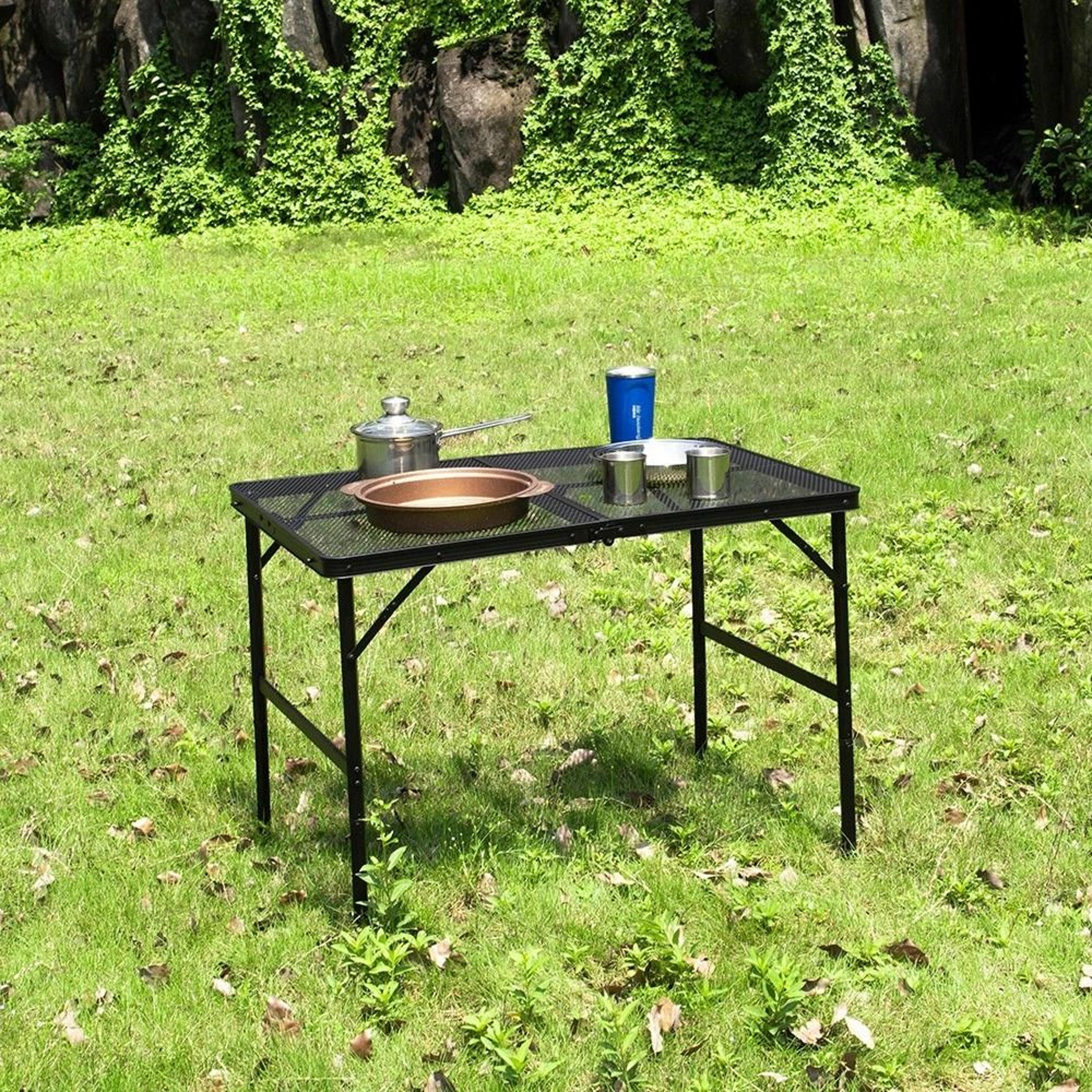 adjustable height foldable camping table with mesh desktop – perfect for bbqs and outdoor adventures