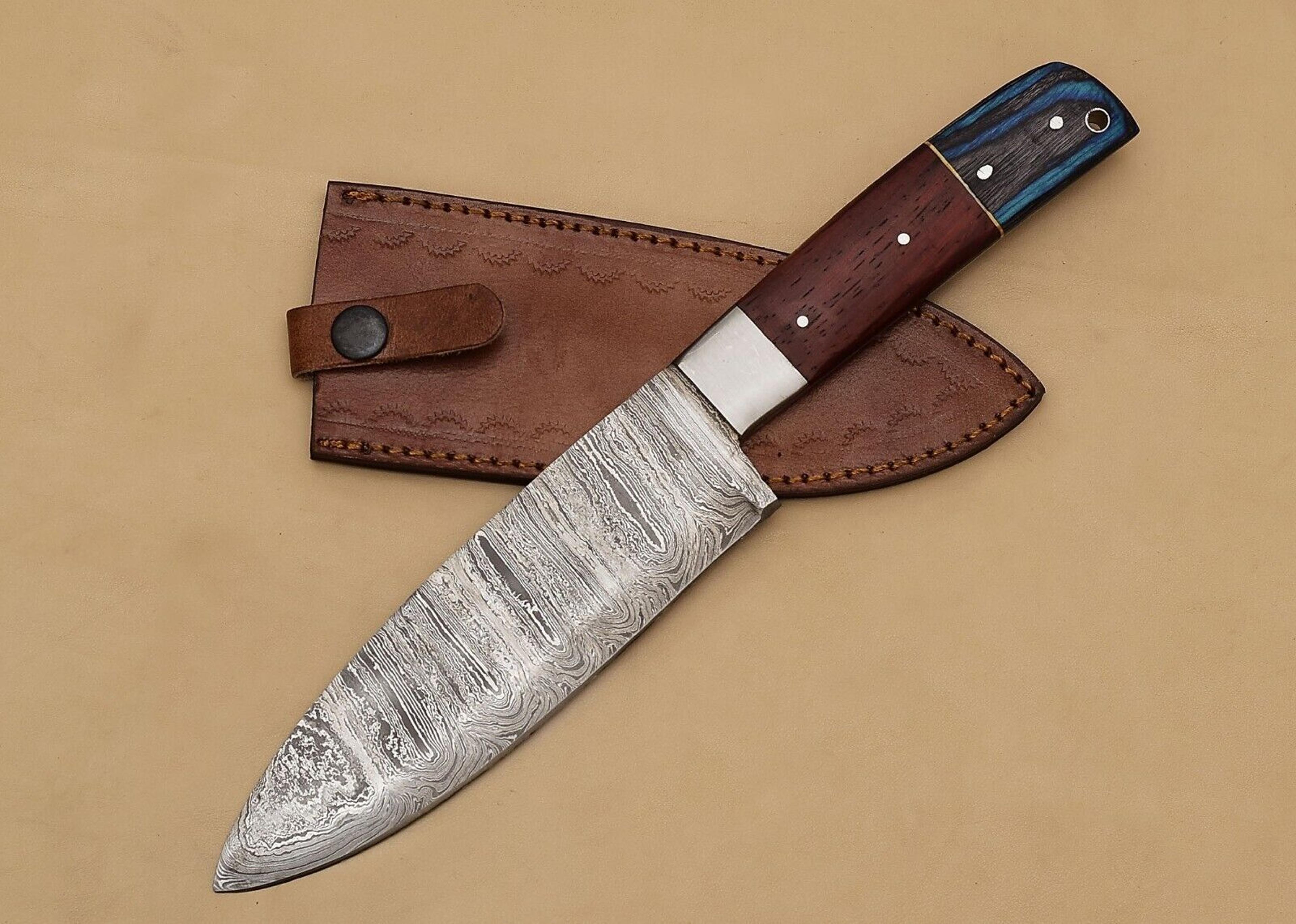 artisan-crafted damascus steel fillet knife with polished pakka wood handle & sheath