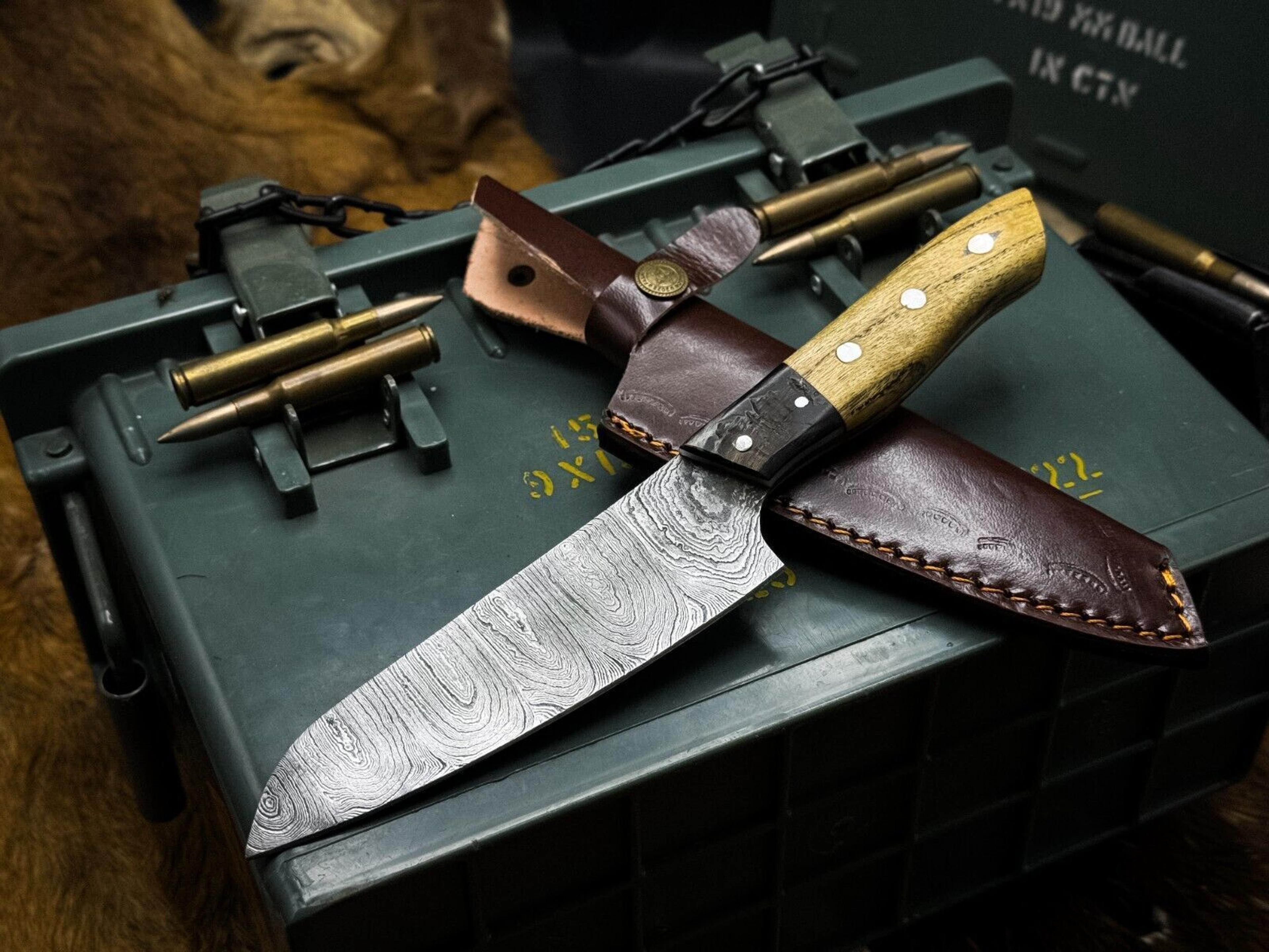 hand-forged damascus steel chef knife with natural ram horn handle