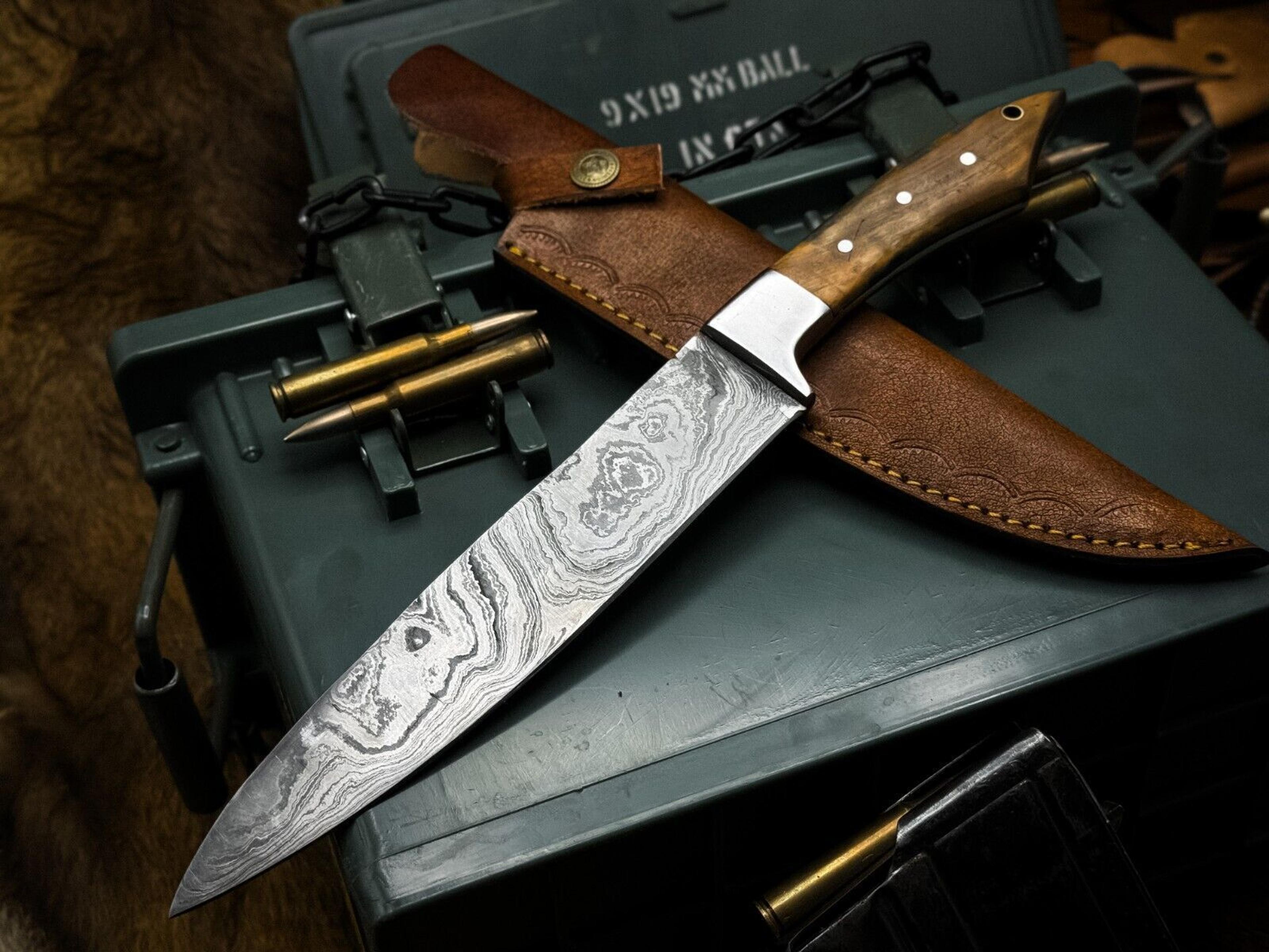 hand-forged damascus steel cooking knife with natural wood handle