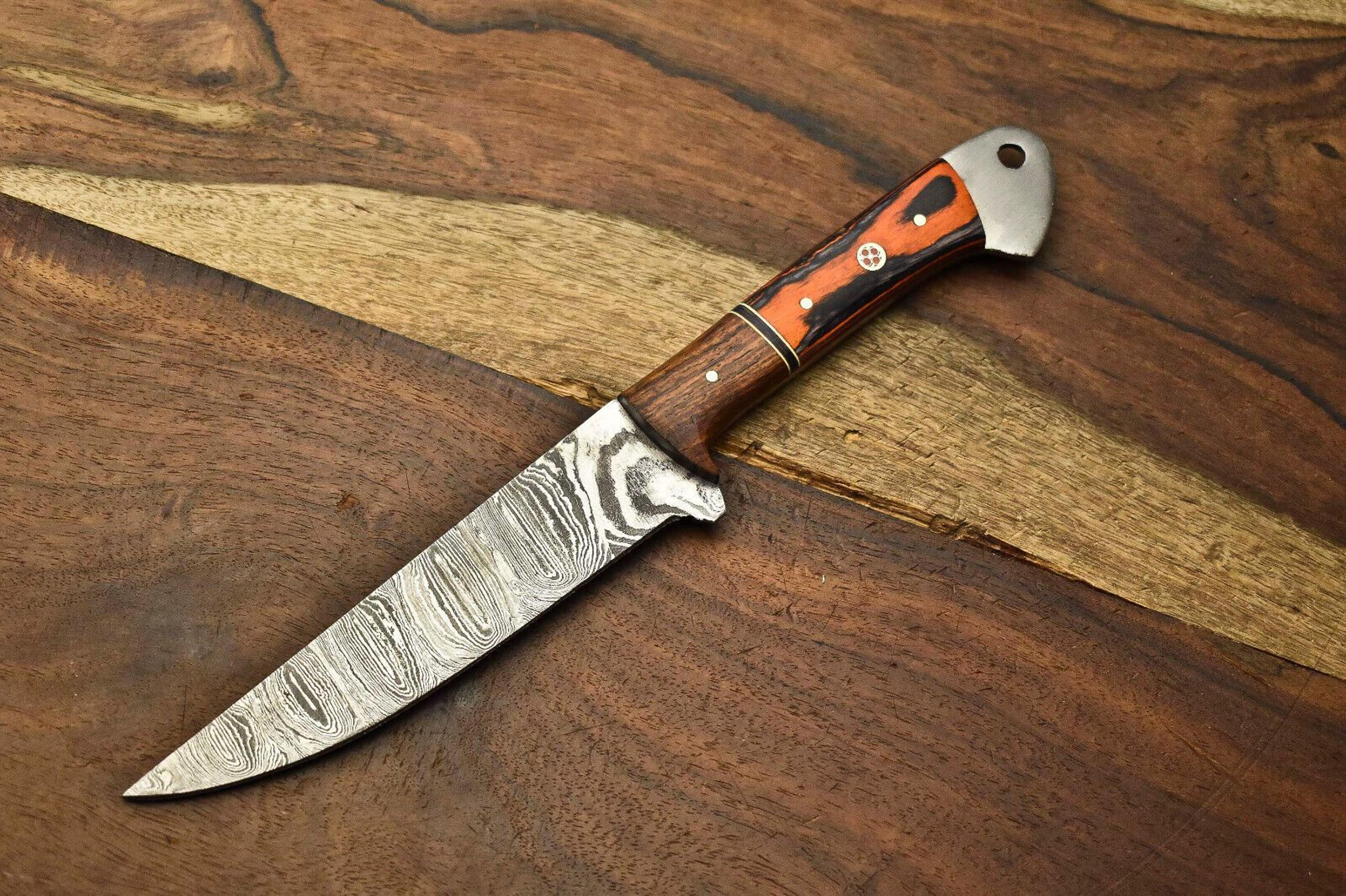 twist pattern damascus chef knife with premium walnut handle