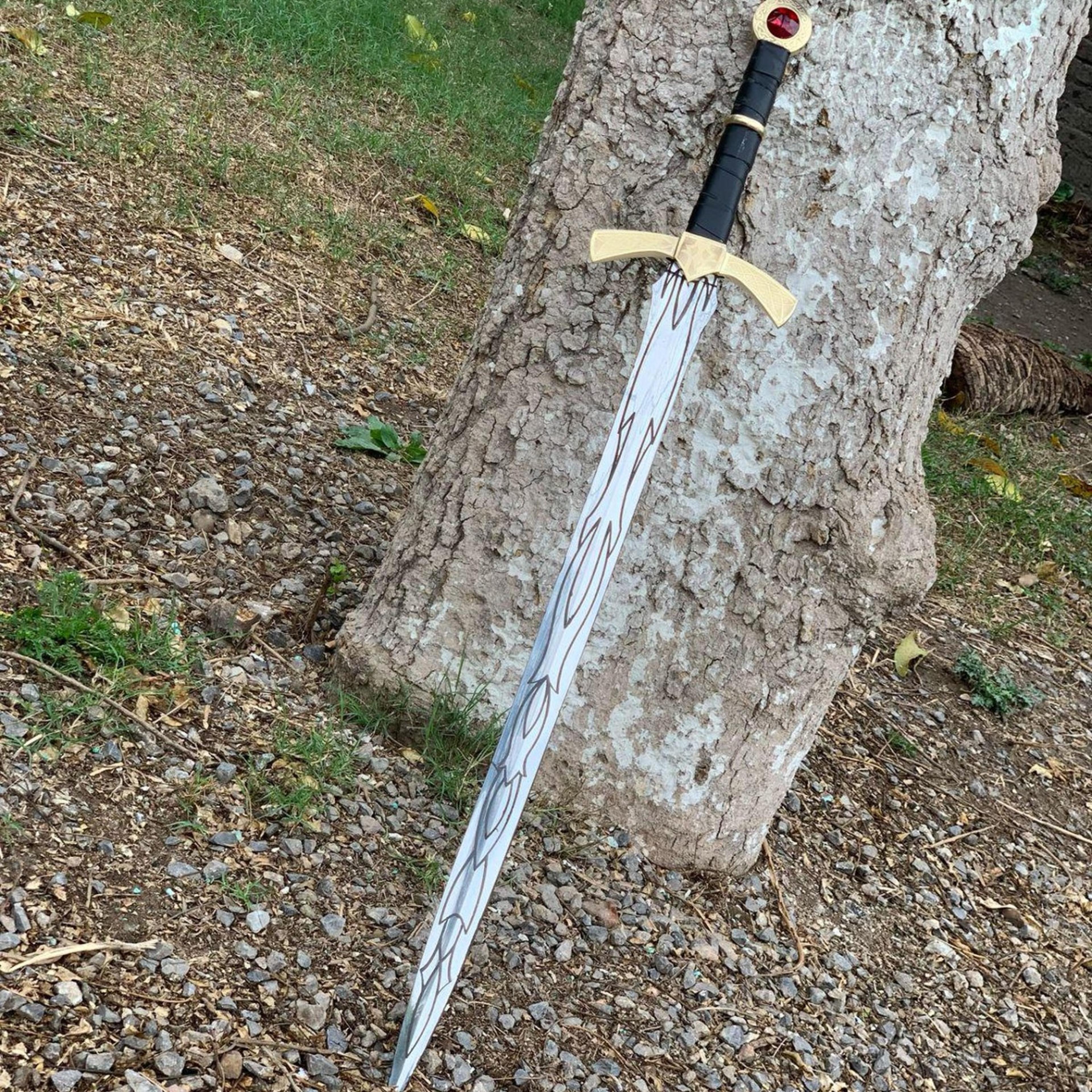 hand forged flame-runed knight sword – long silver blade with brass guard & ruby pommel