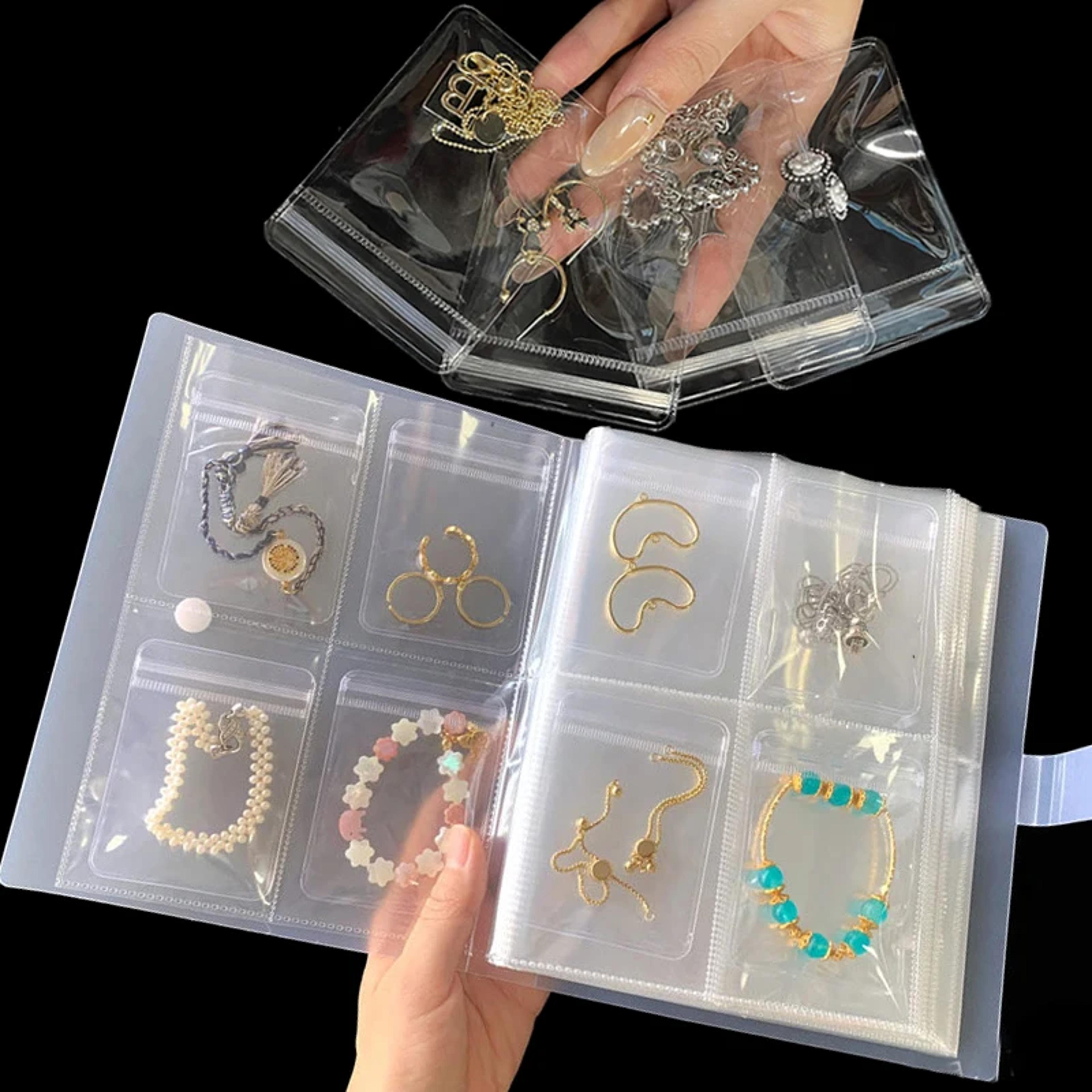 transparent jewelry organizer book for tangle free necklace and ring storage