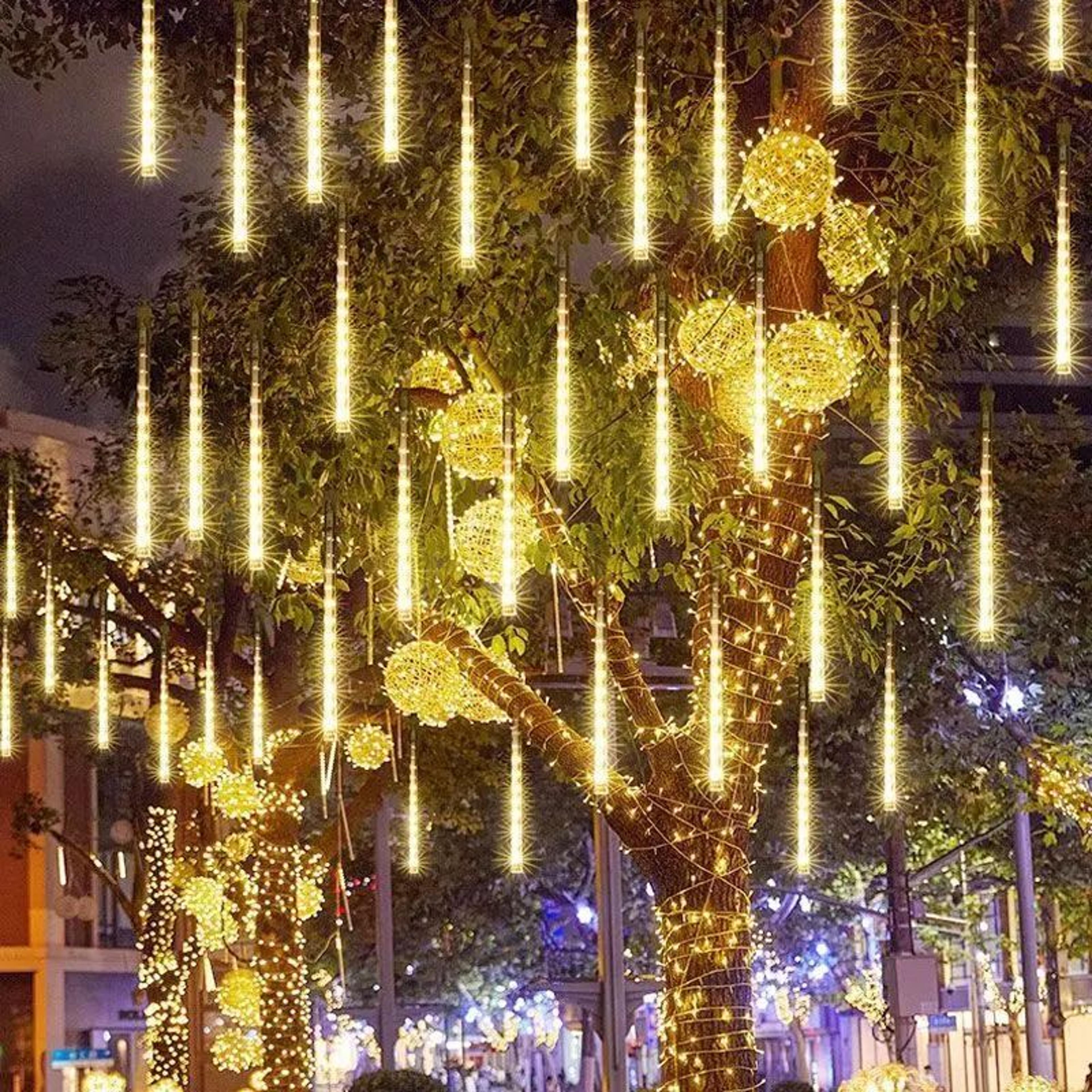 outdoor led dripping icicle lights, snowfall effect holiday decor for roof, trees & more