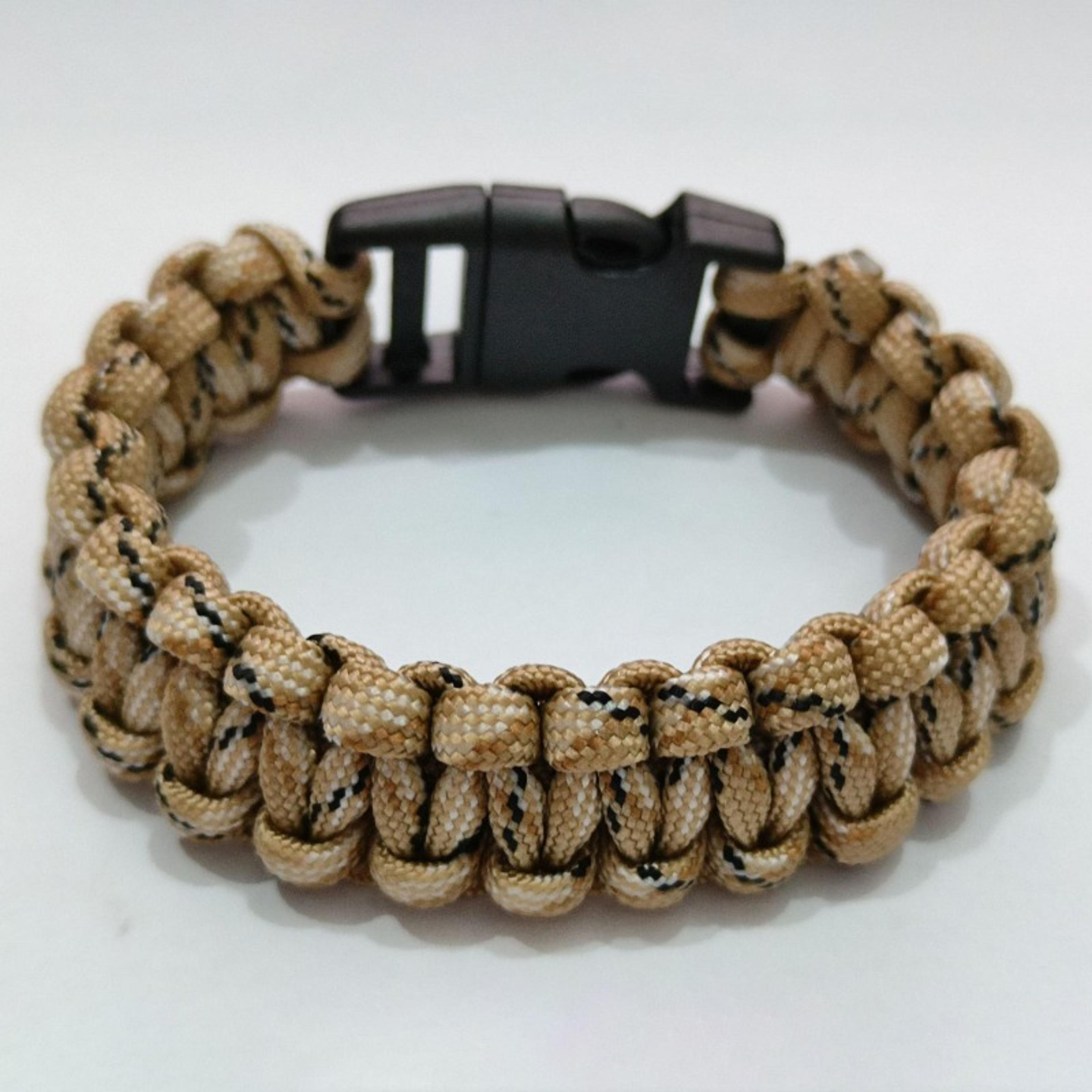 all-in-one survival bracelet with fire starter compass whistle paracord gear for outdoor adventure
