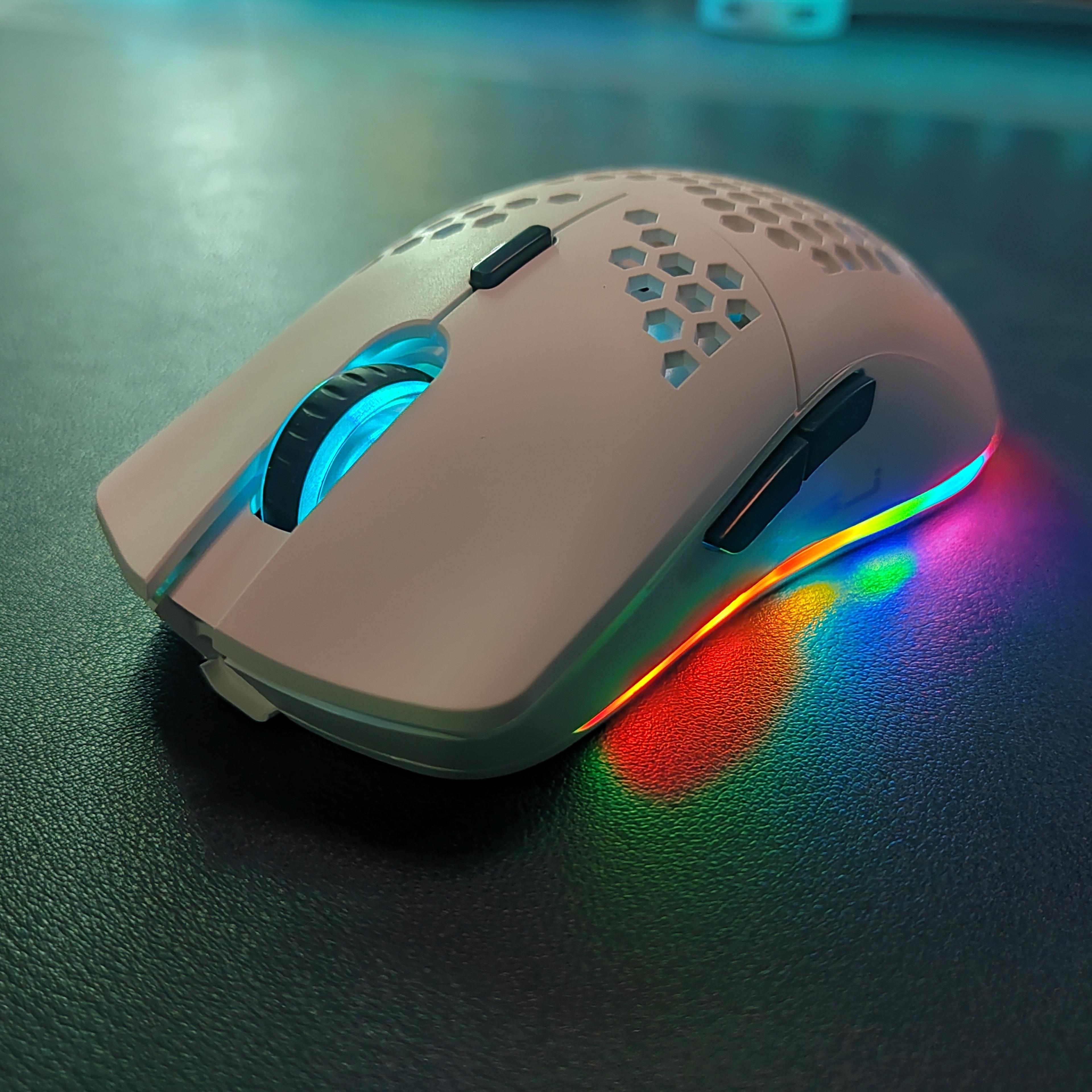 rechargeable wireless gaming mouse with rgb lights ultra lightweight honeycomb design dpi